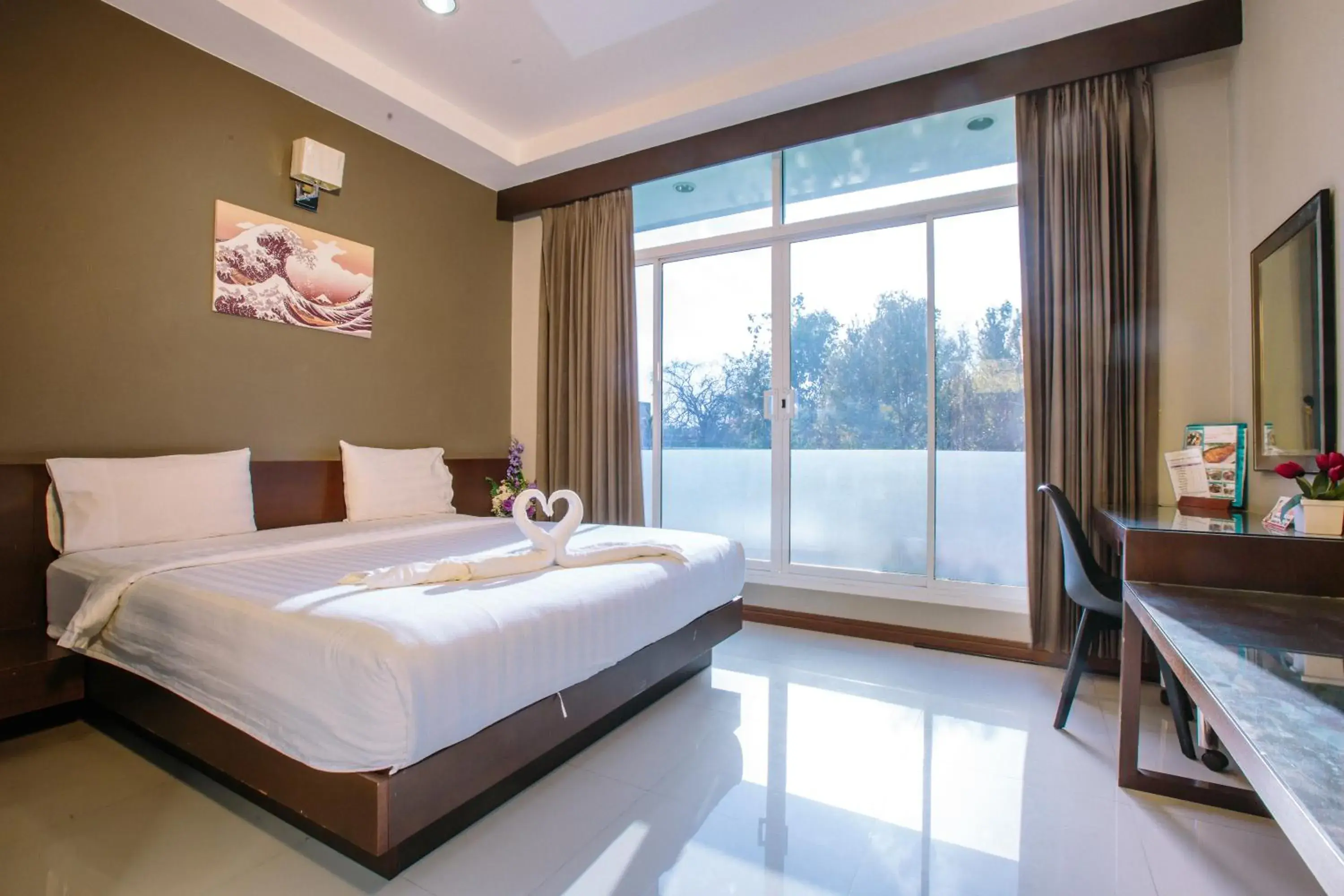 Photo of the whole room, Bed in Jintana Resort Photo of the whole room, Bed in Jintana Resort