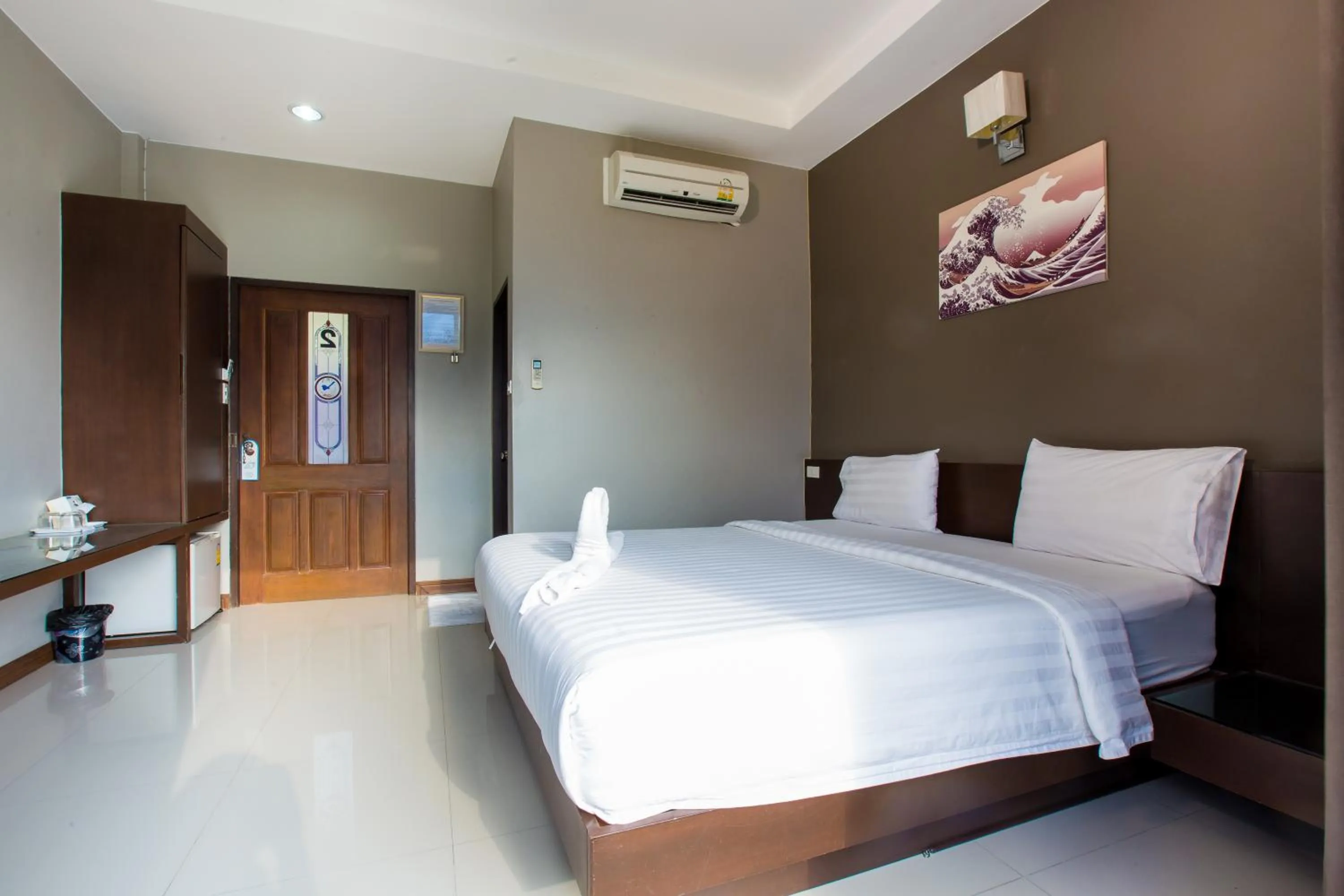 Bed in Jintana Resort