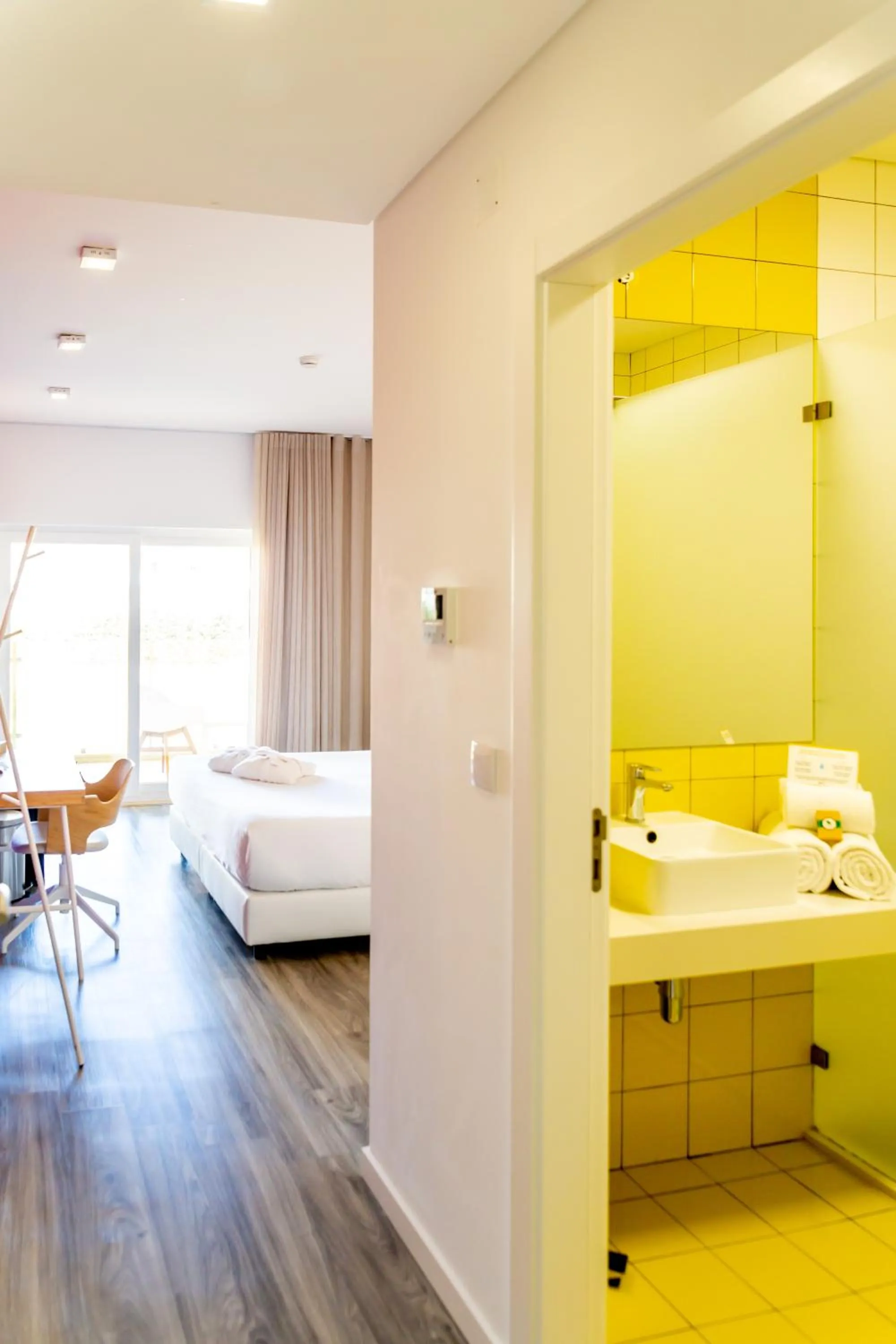 Bed in RIDE Surf Resort & Spa Peniche