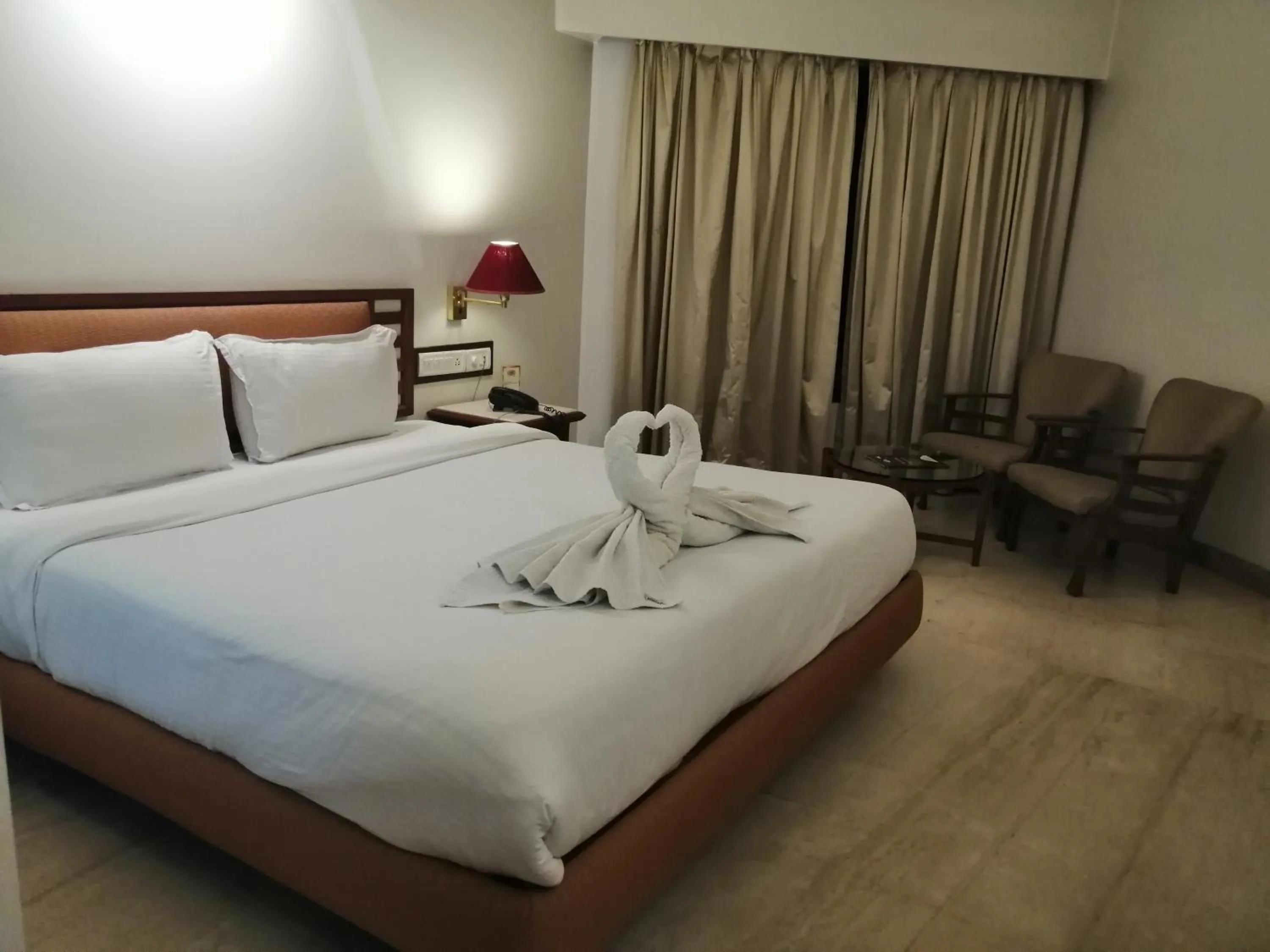 Bed in Hotel Maharaja Regency