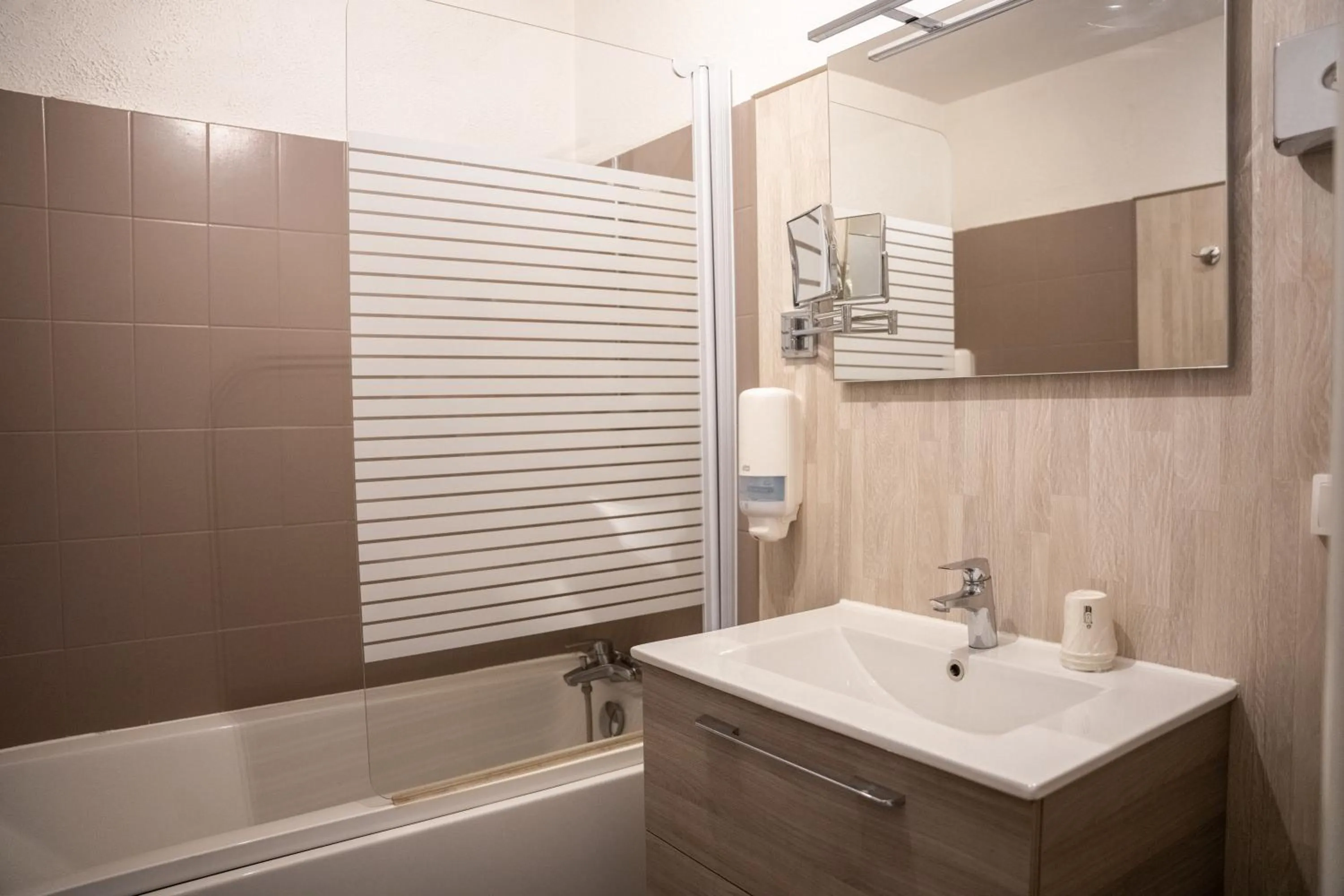 Bathroom in Logis Hotel des Granges