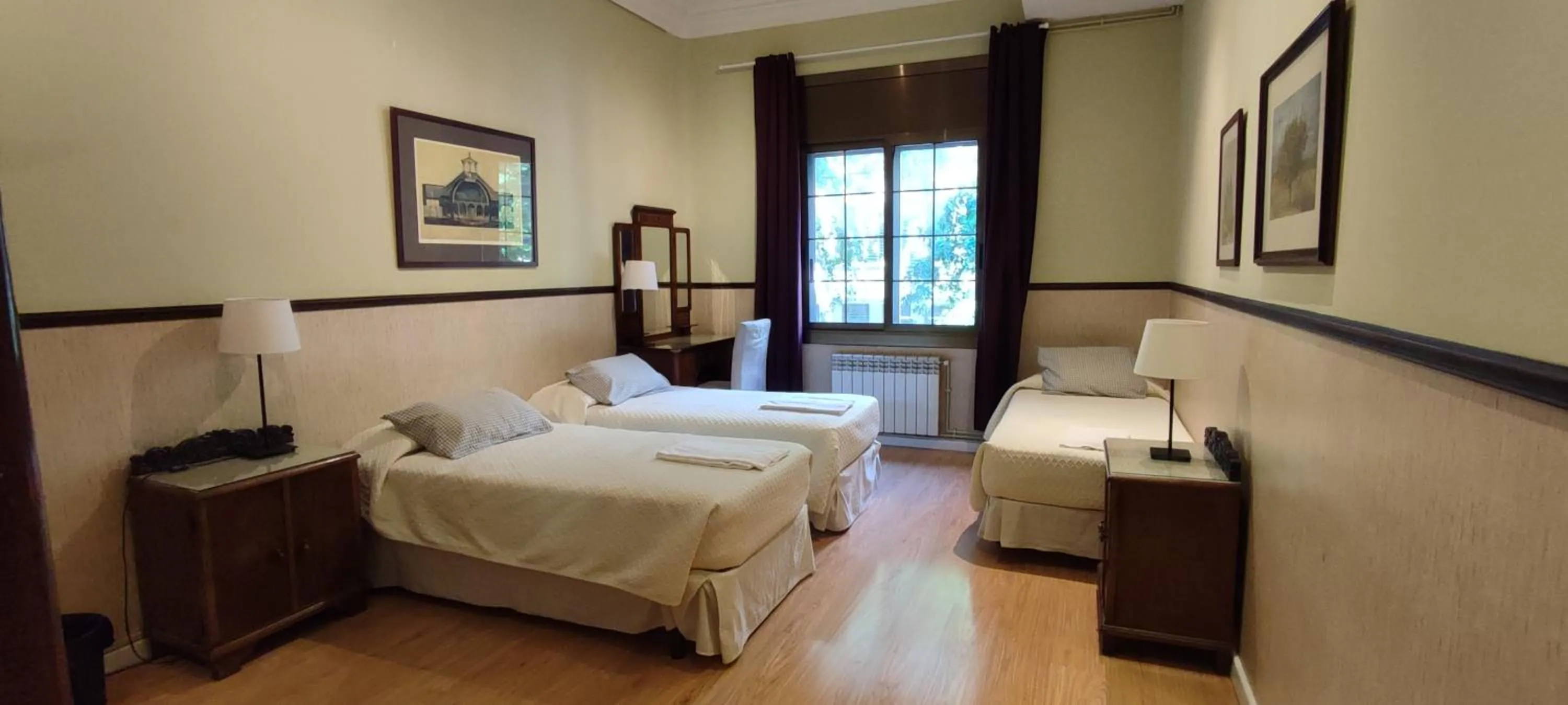 Bed in Casa Consell Apartments