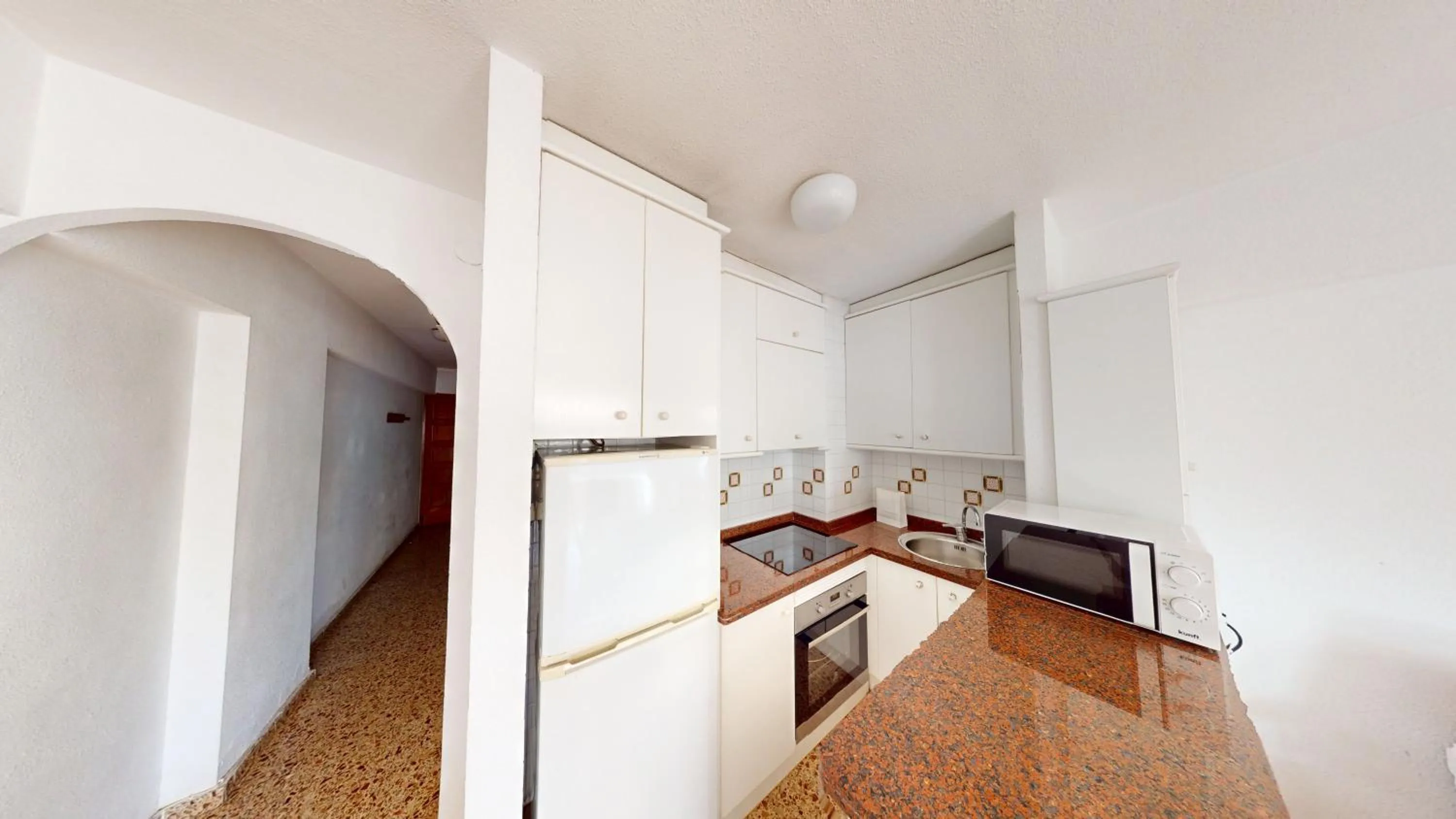 Kitchen or kitchenette in Apartamentos Concorde