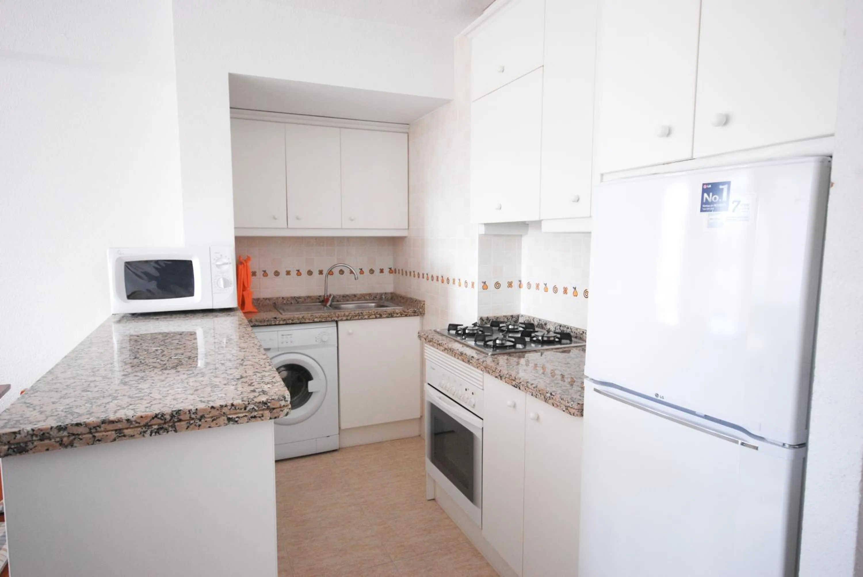 Kitchen or kitchenette in Apartamentos Concorde