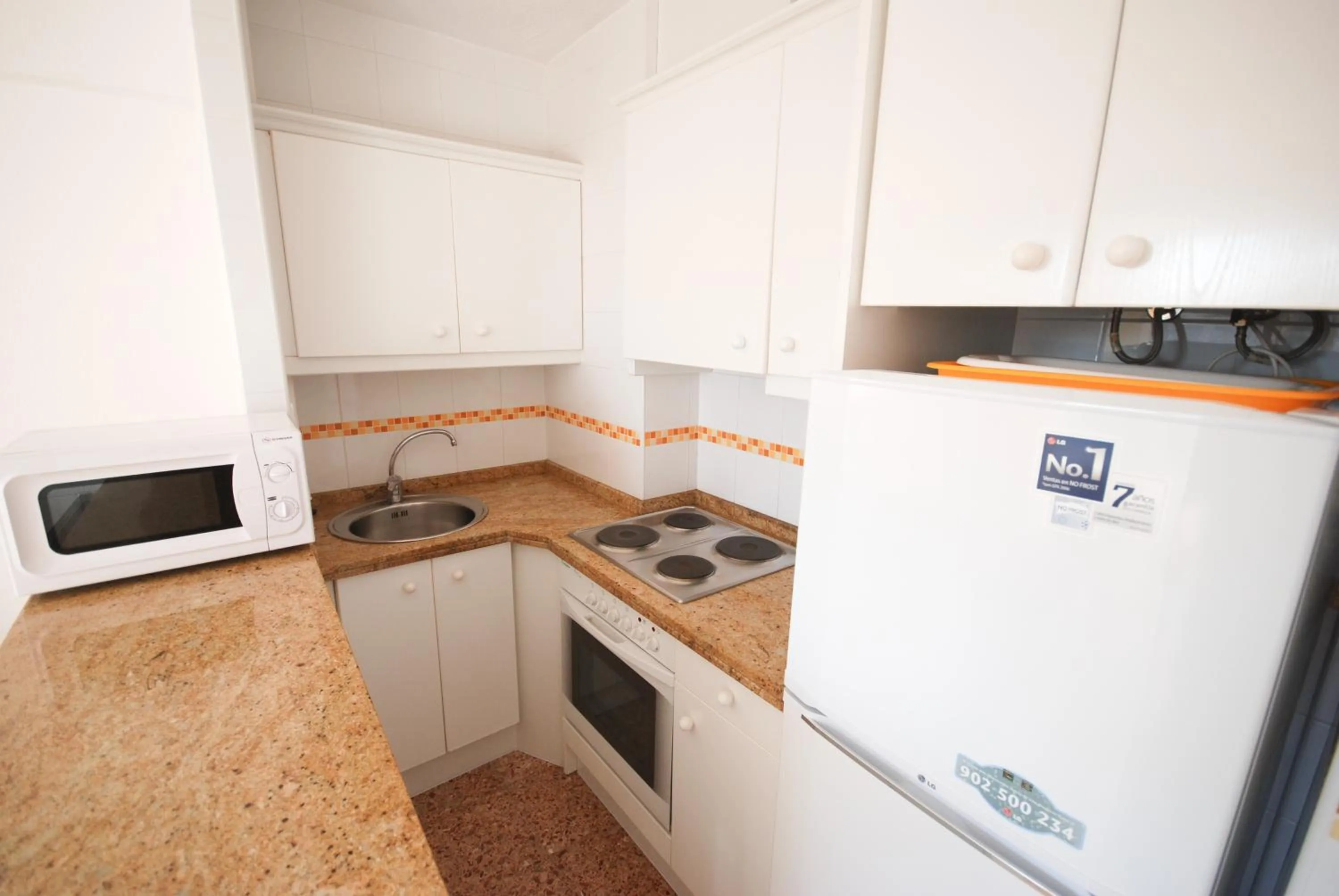 Kitchen or kitchenette in Apartamentos Concorde