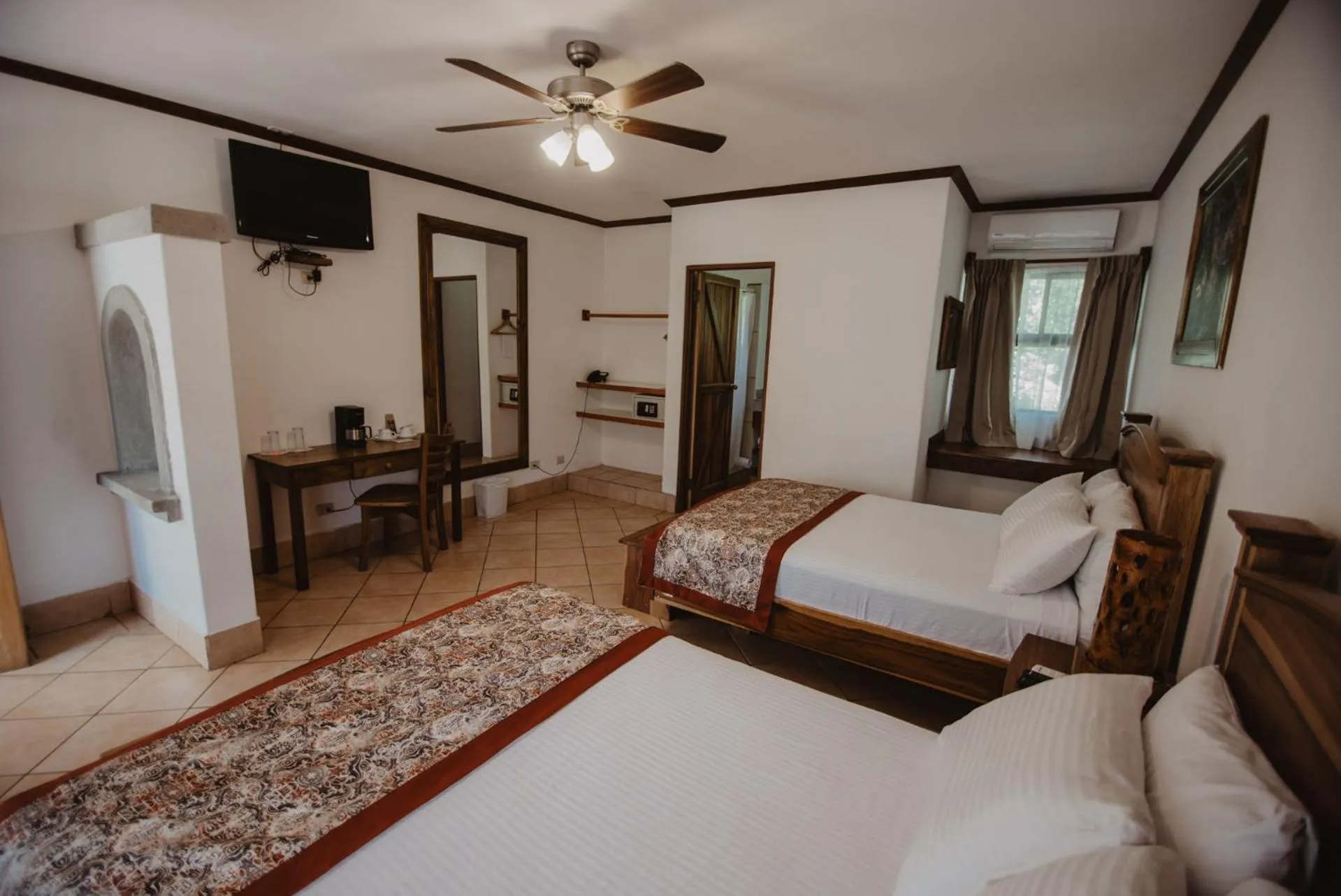 Photo of the whole room, Bed in Hacienda Guachipelin Volcano Ranch Hotel & Hot Springs