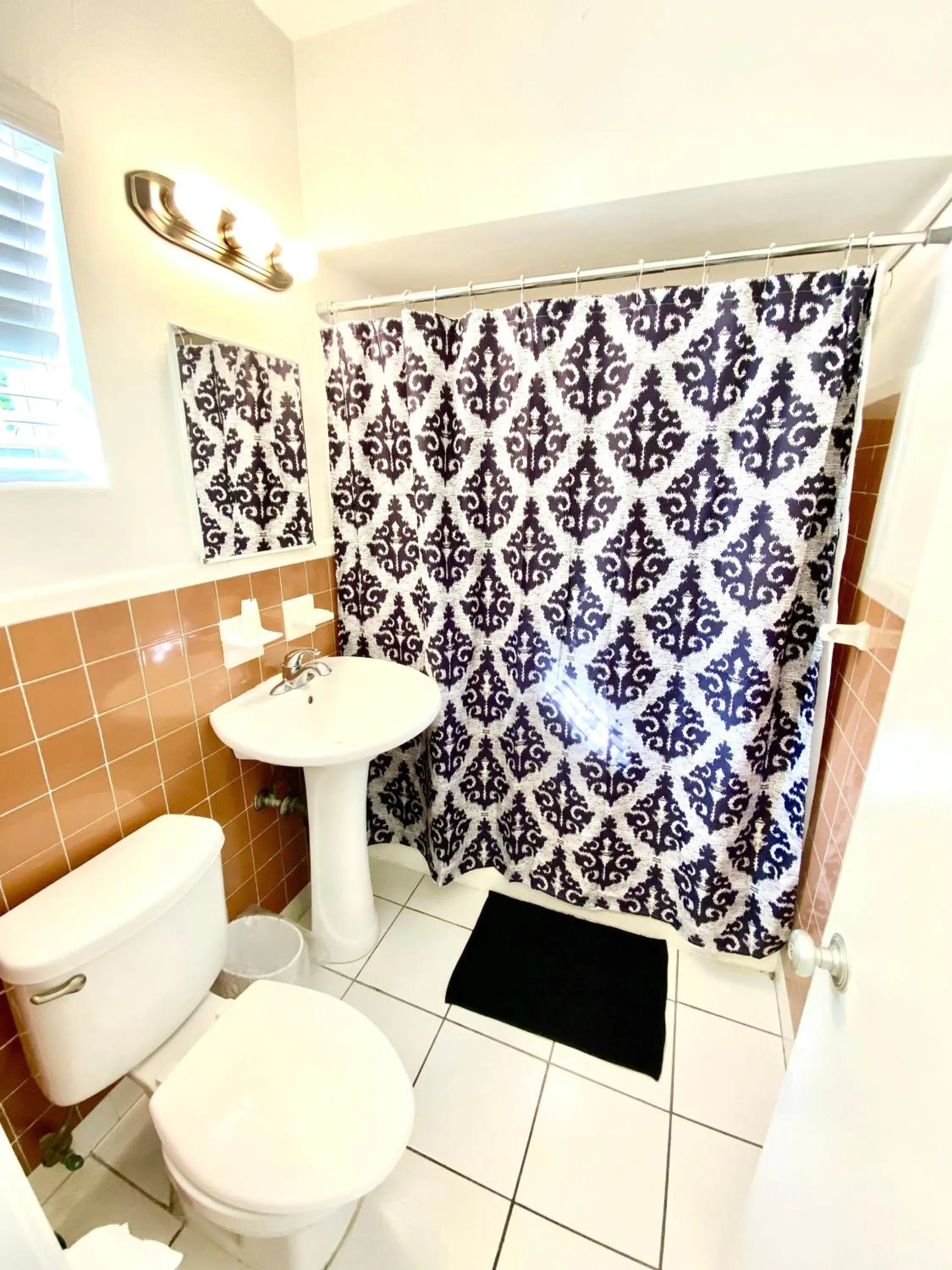 Shower in Southwinds Inn by The Gold Nests