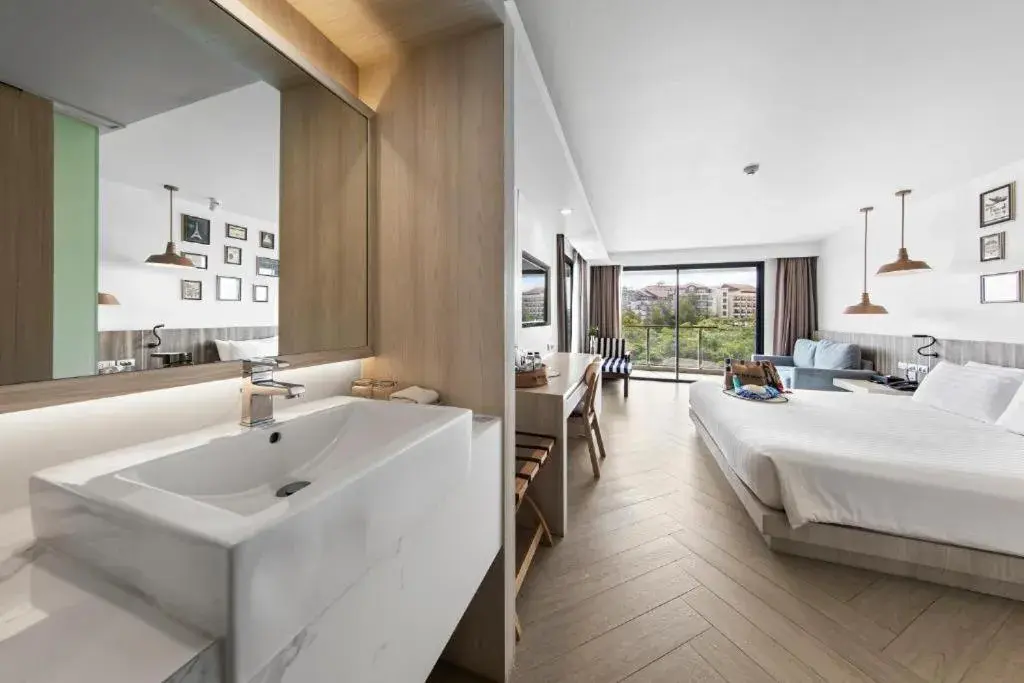 Bed in Golden Tulip Pattaya Beachfront Resort Bed in Golden Tulip Pattaya Beachfront Resort