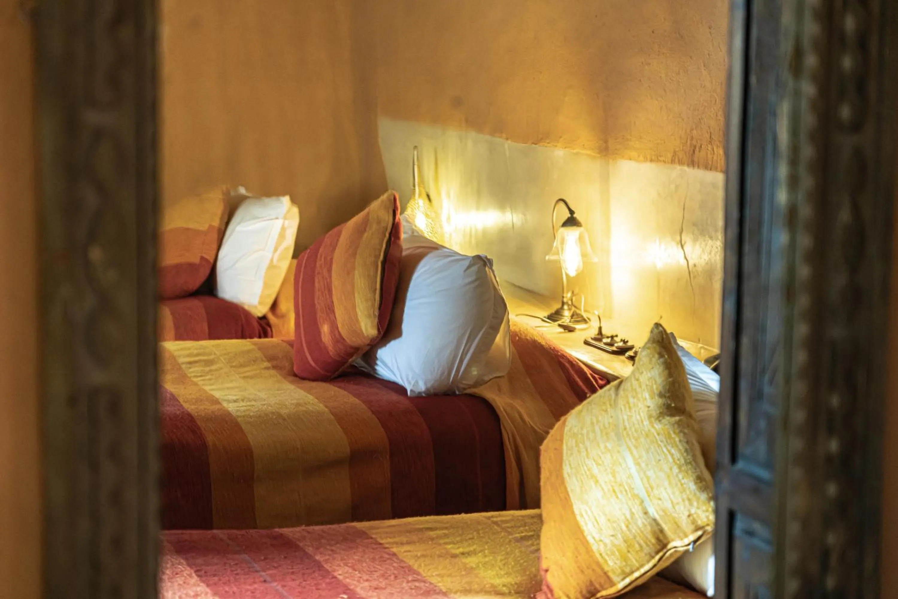 Bed in Kasbah Hotel Tombouctou