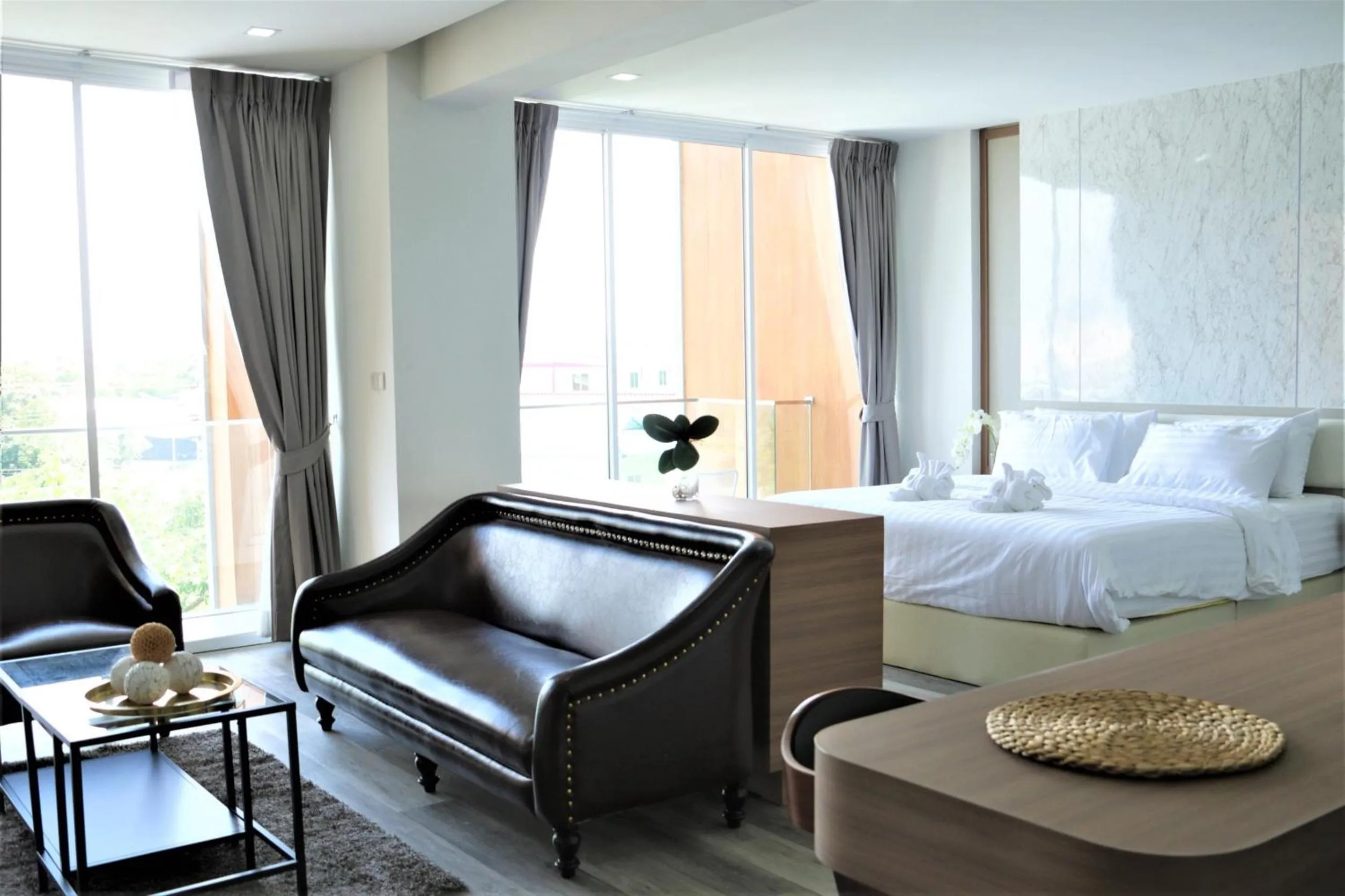 Living room, Bed in Phurinda Residence