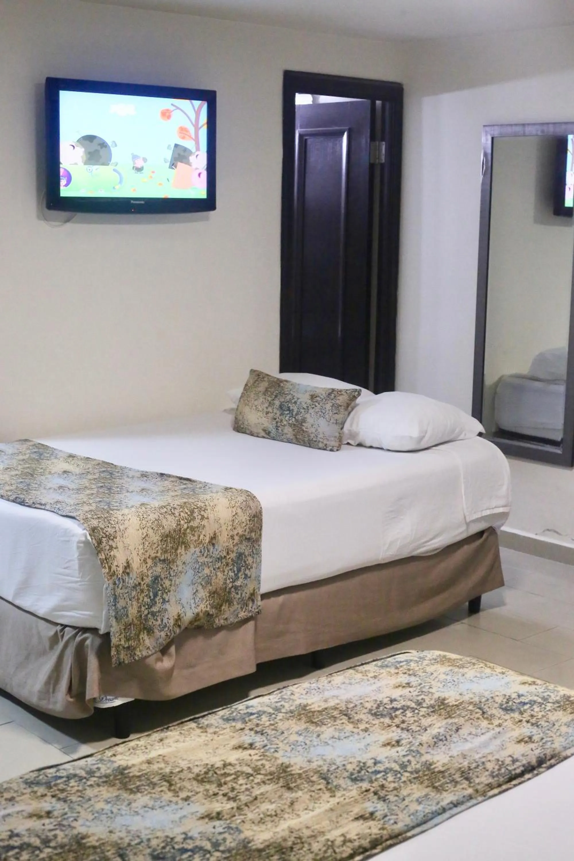 Bed in Metro Hotel Panama