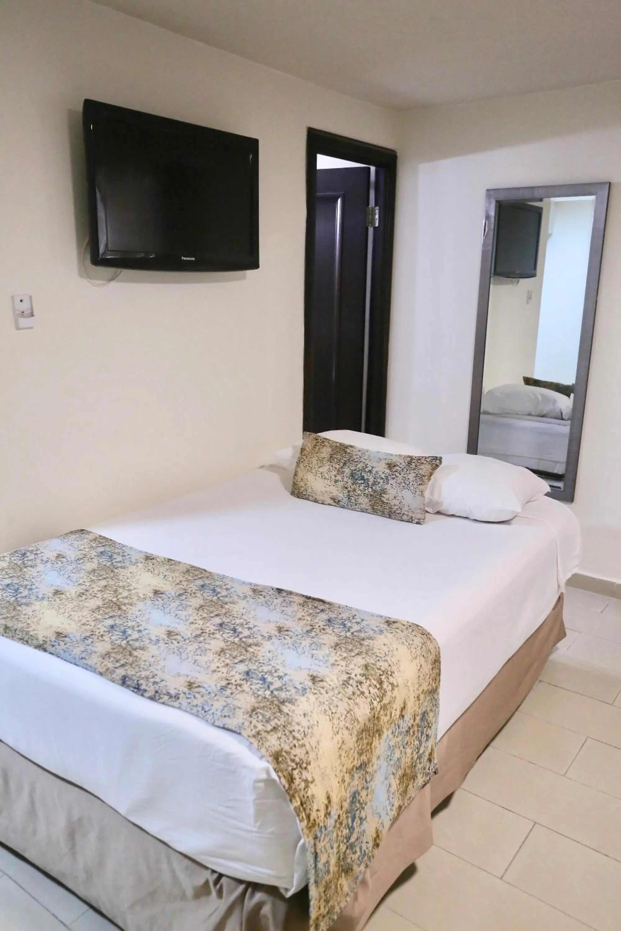 Bed in Metro Hotel Panama