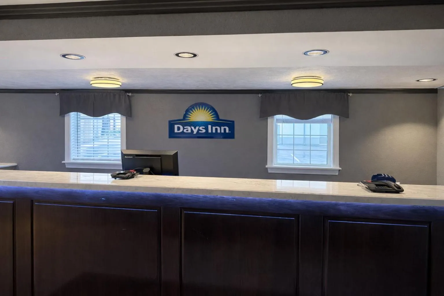 Property logo or sign in Days Inn by Wyndham Amherst