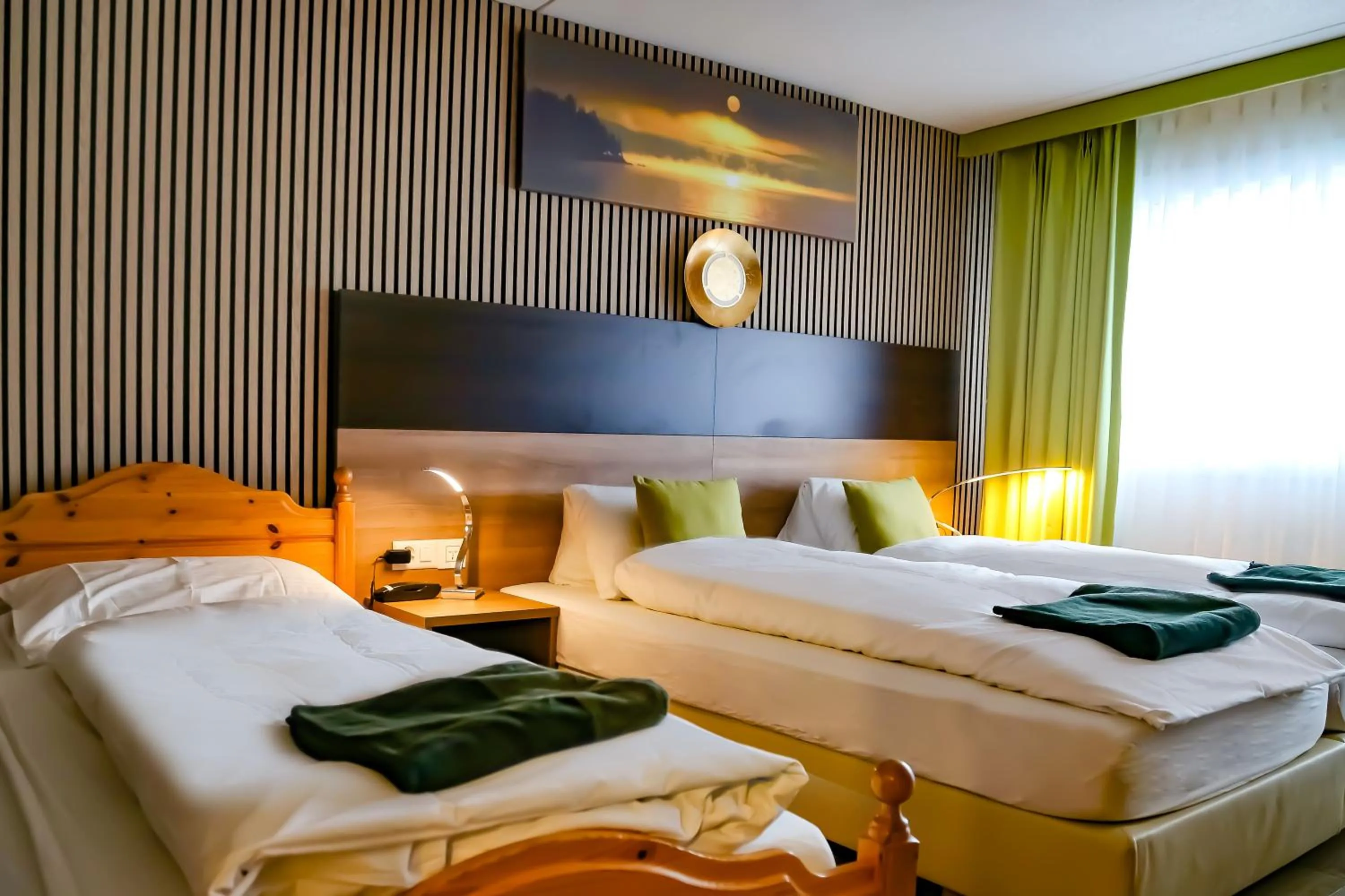 Bed in Hotel Lakeview bei Interlaken