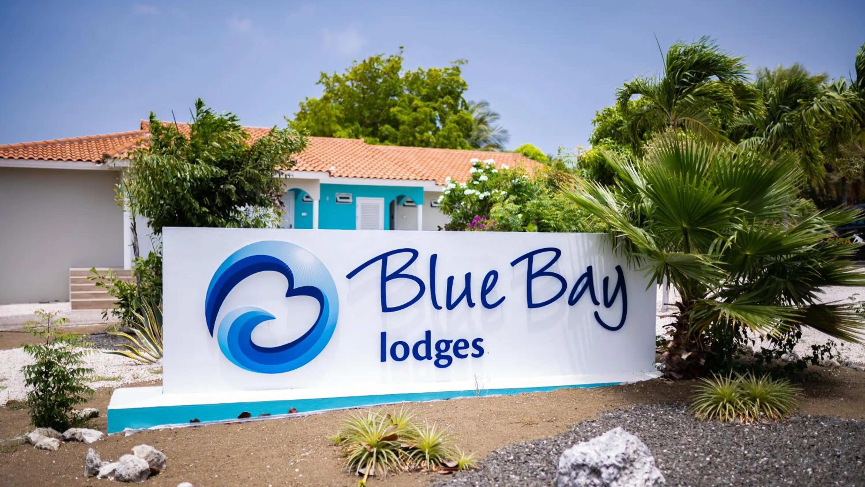 Property logo or sign in Blue Bay Lodges