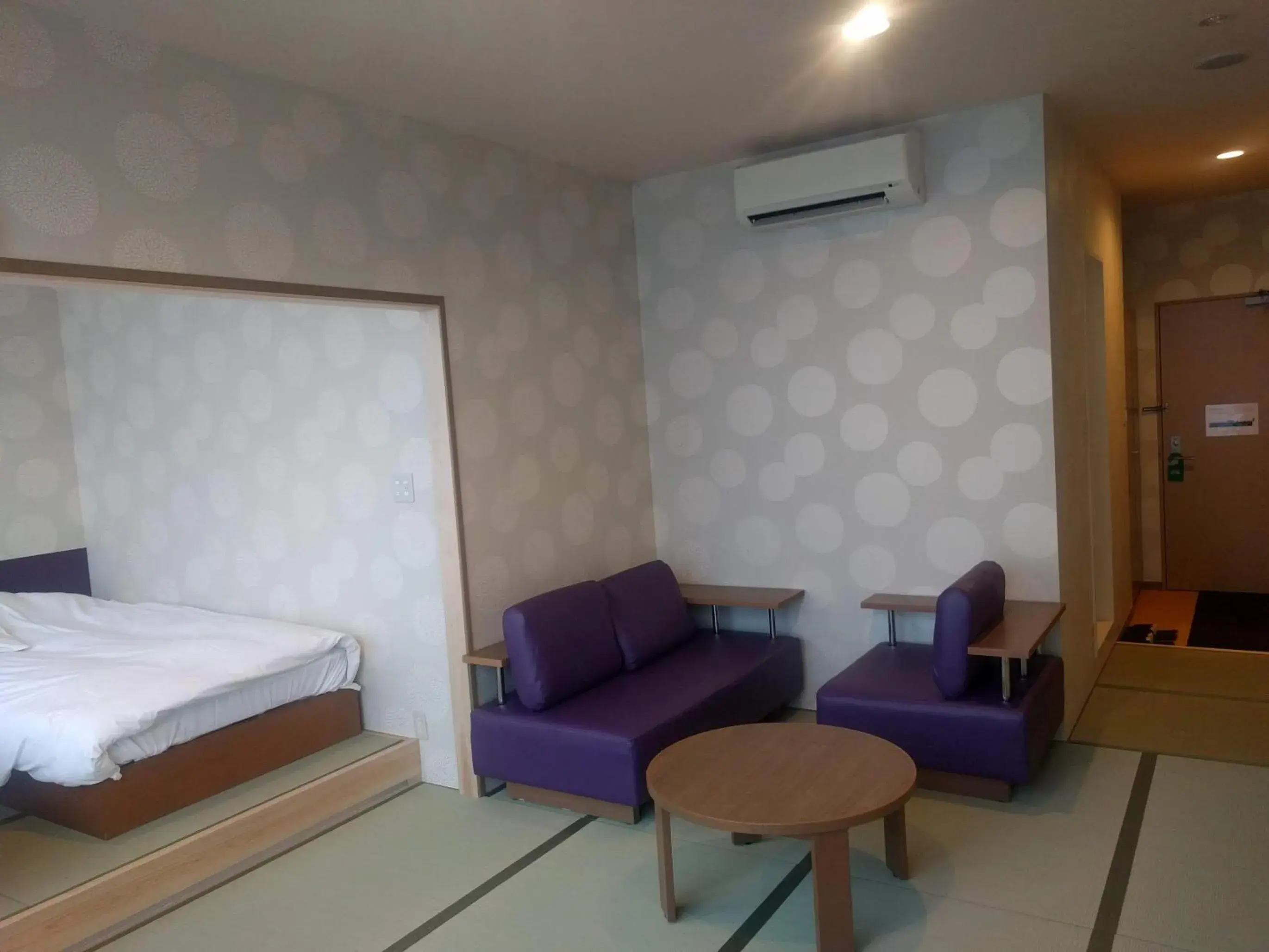 Photo of the whole room, Bed in Bayside Square Kaike Hotel Photo of the whole room, Bed in Bayside Square Kaike Hotel