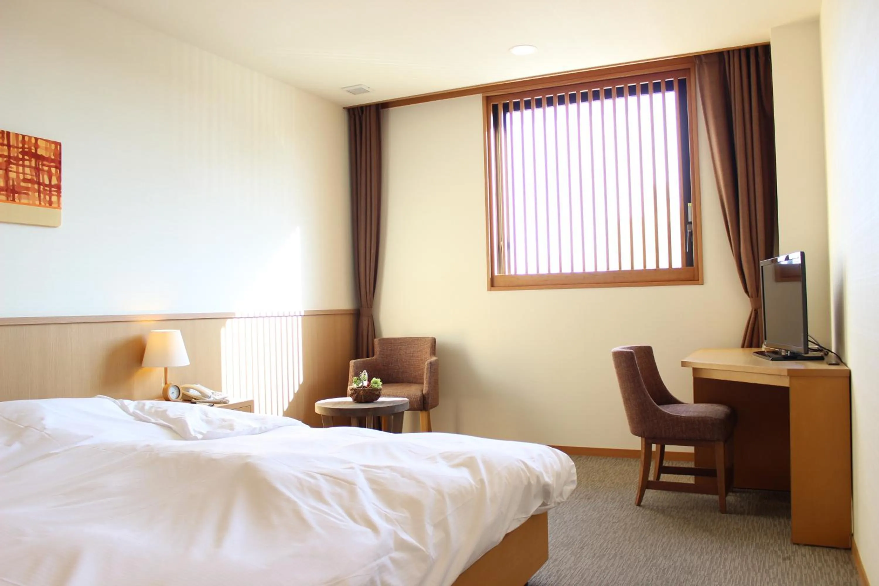 Bed in Bayside Square Kaike Hotel