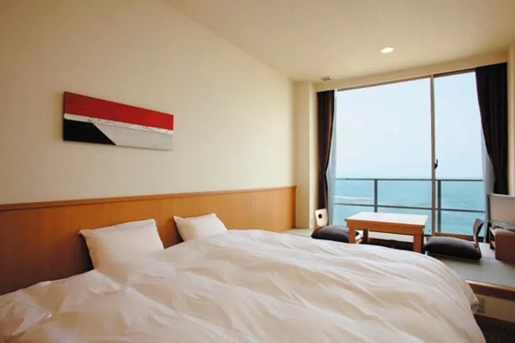 Bed in Bayside Square Kaike Hotel Bed in Bayside Square Kaike Hotel