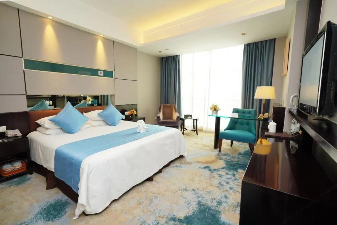 Bed in Royal Palace Hotel Haining