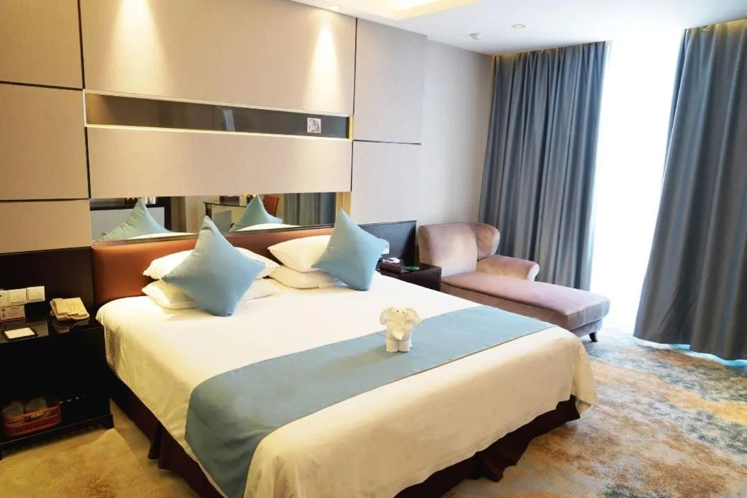 Bed in Royal Palace Hotel Haining