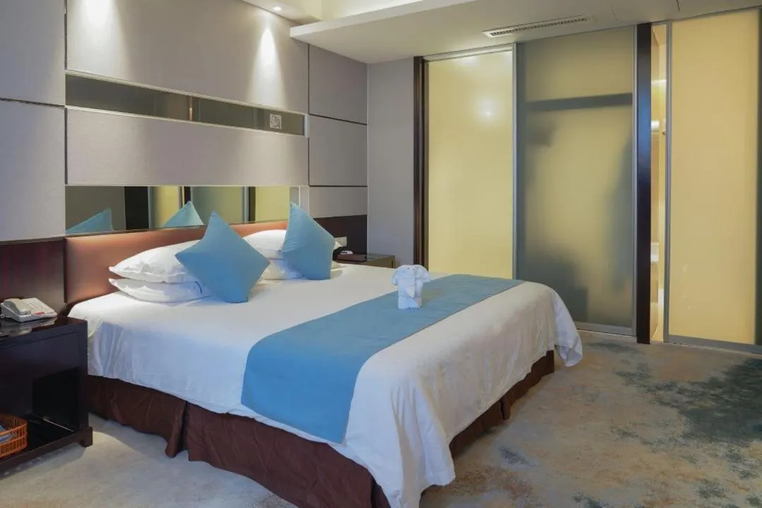 Bed in Royal Palace Hotel Haining