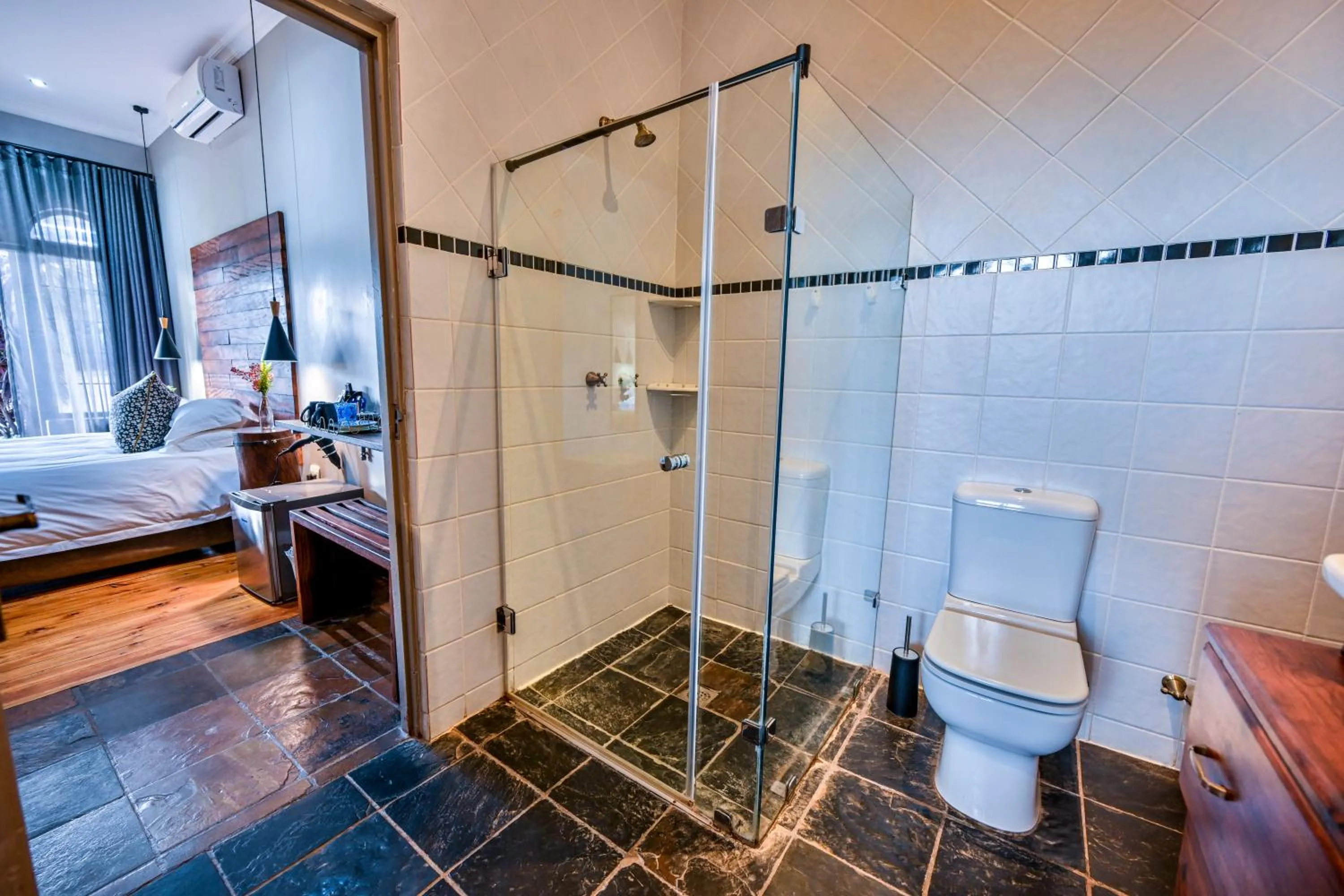 Shower, Bed in Blue Rain Guest House