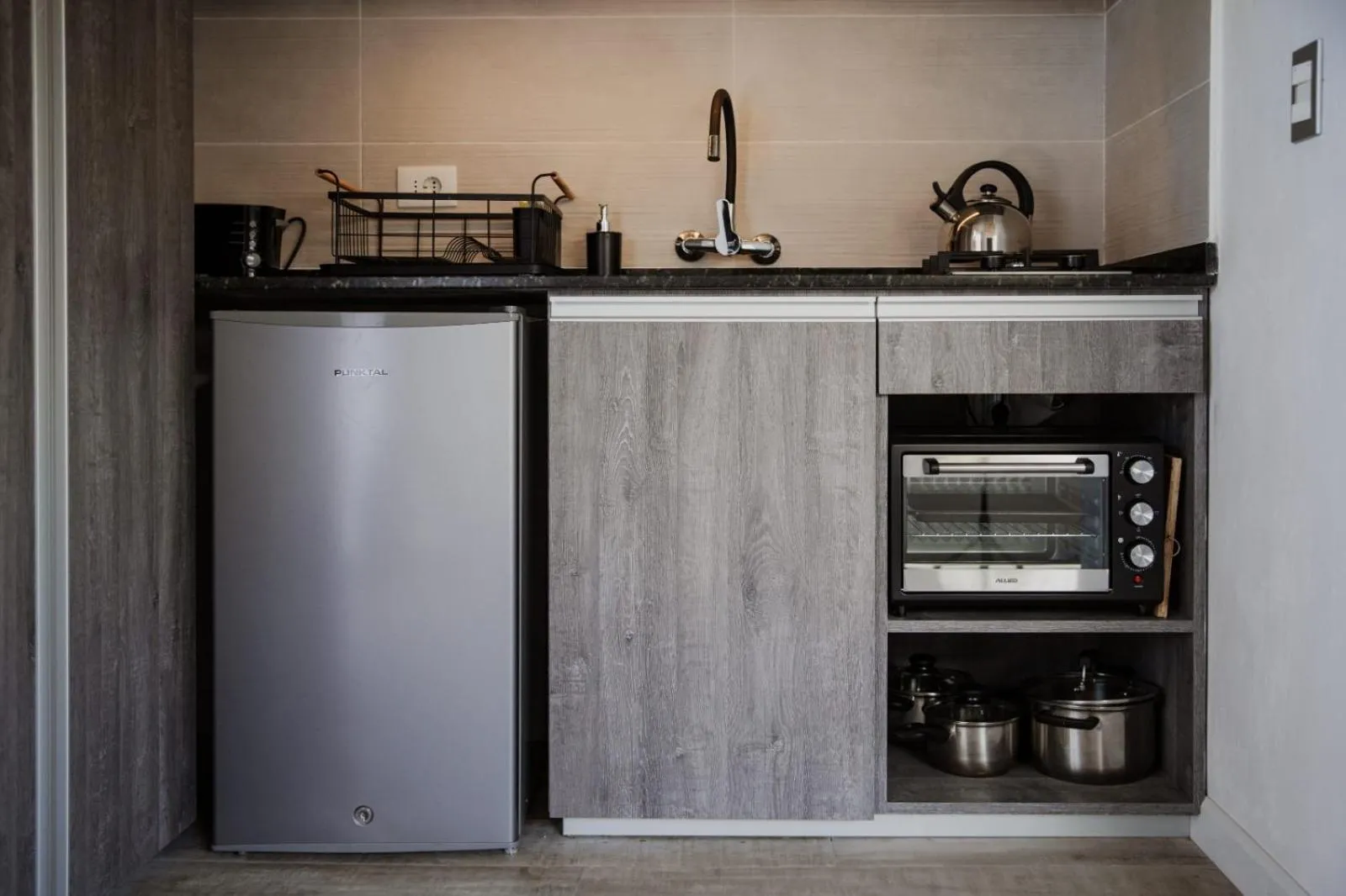 Kitchen or kitchenette in Aloe Village Aparthotel & Spa