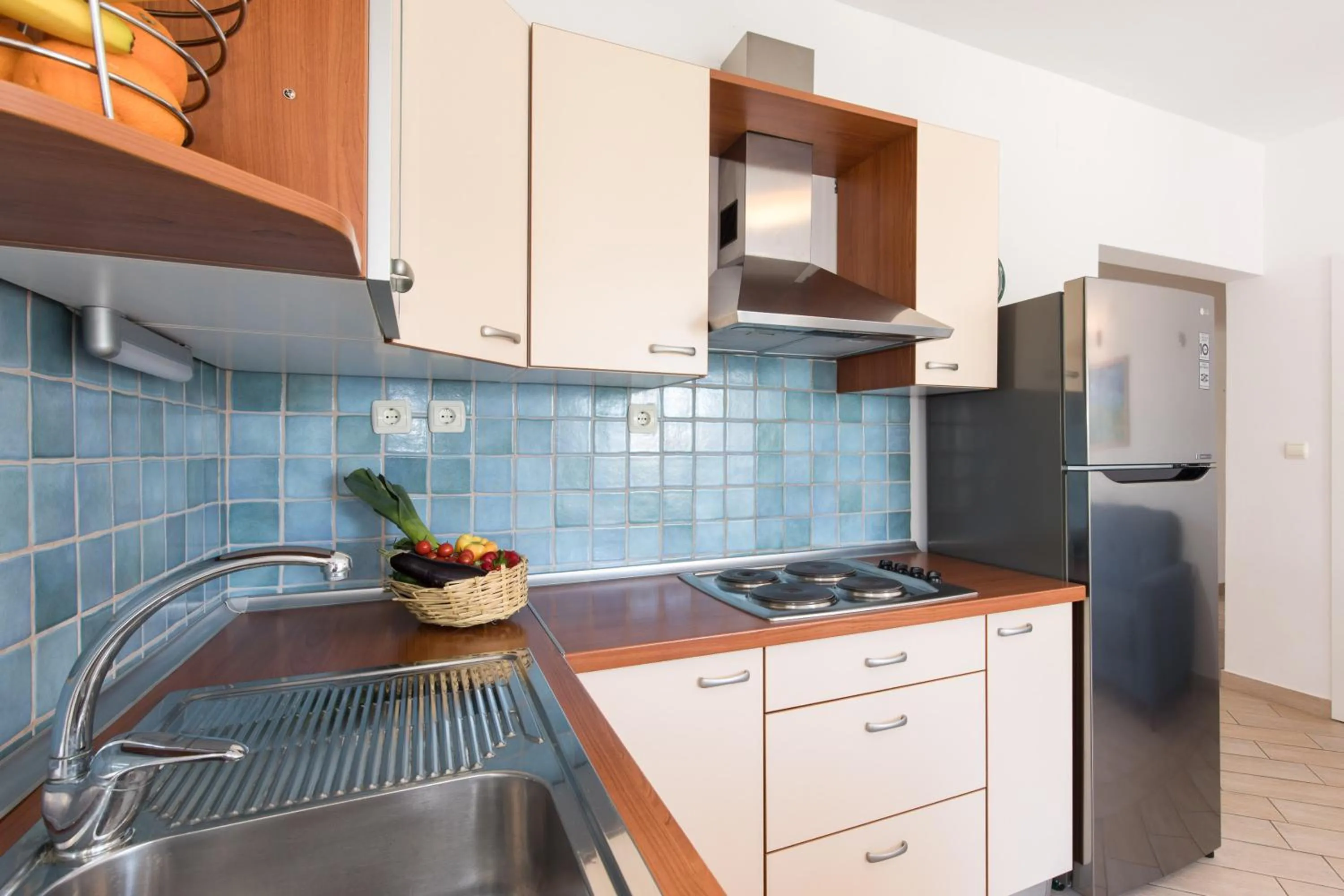 Kitchen or kitchenette in Apartments Ivona
