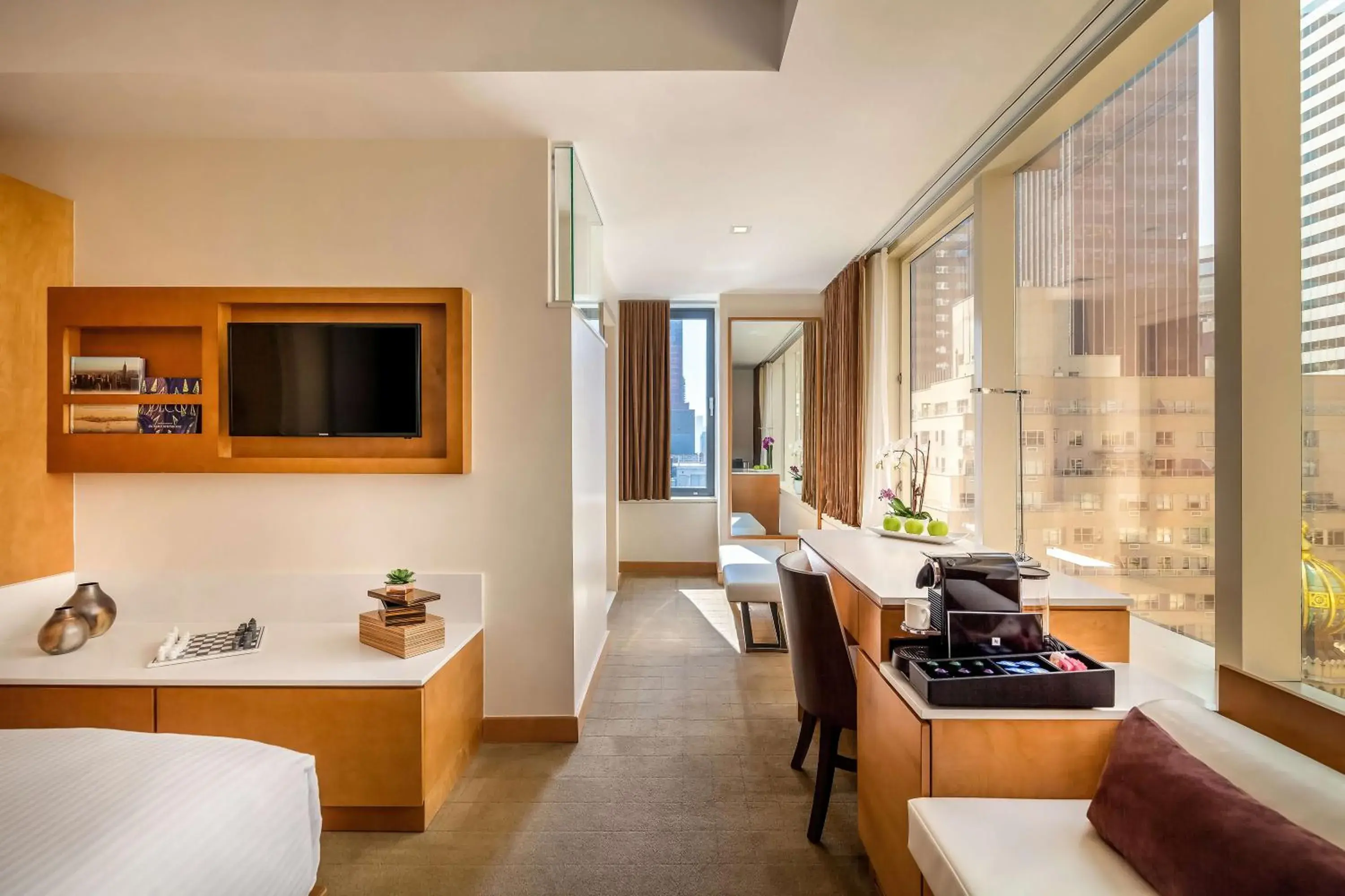 Seating area, Bed in Concorde Hotel New York Seating area, Bed in Concorde Hotel New York