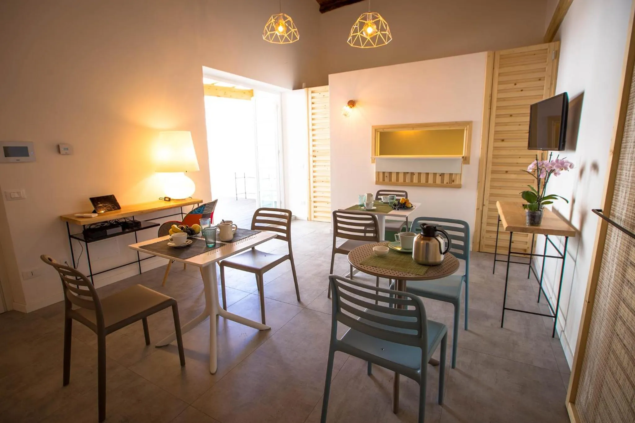 Communal lounge/ TV room in B&B Da Peppa