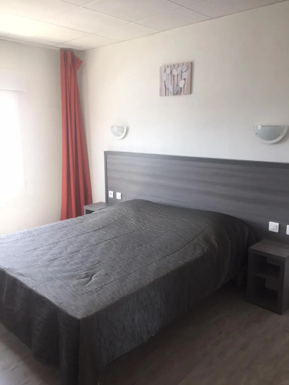 Bed in Hôtel Le Neptune