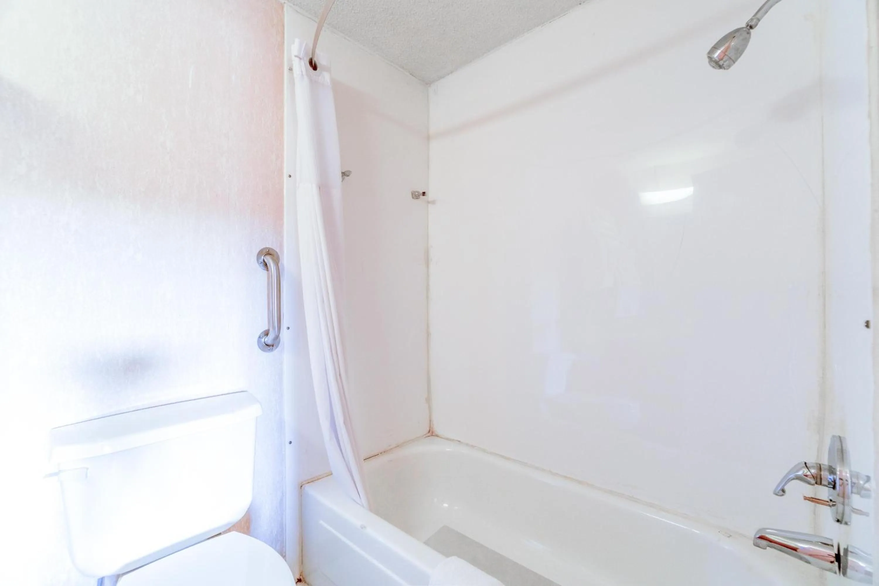 Bathroom in Ozark Junction mountain view by OYO