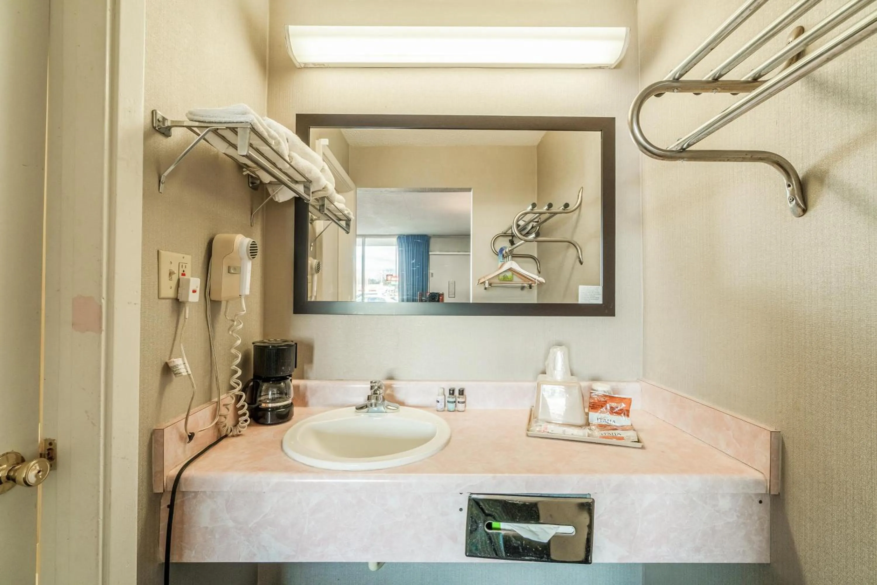 Bathroom in Ozark Junction mountain view by OYO