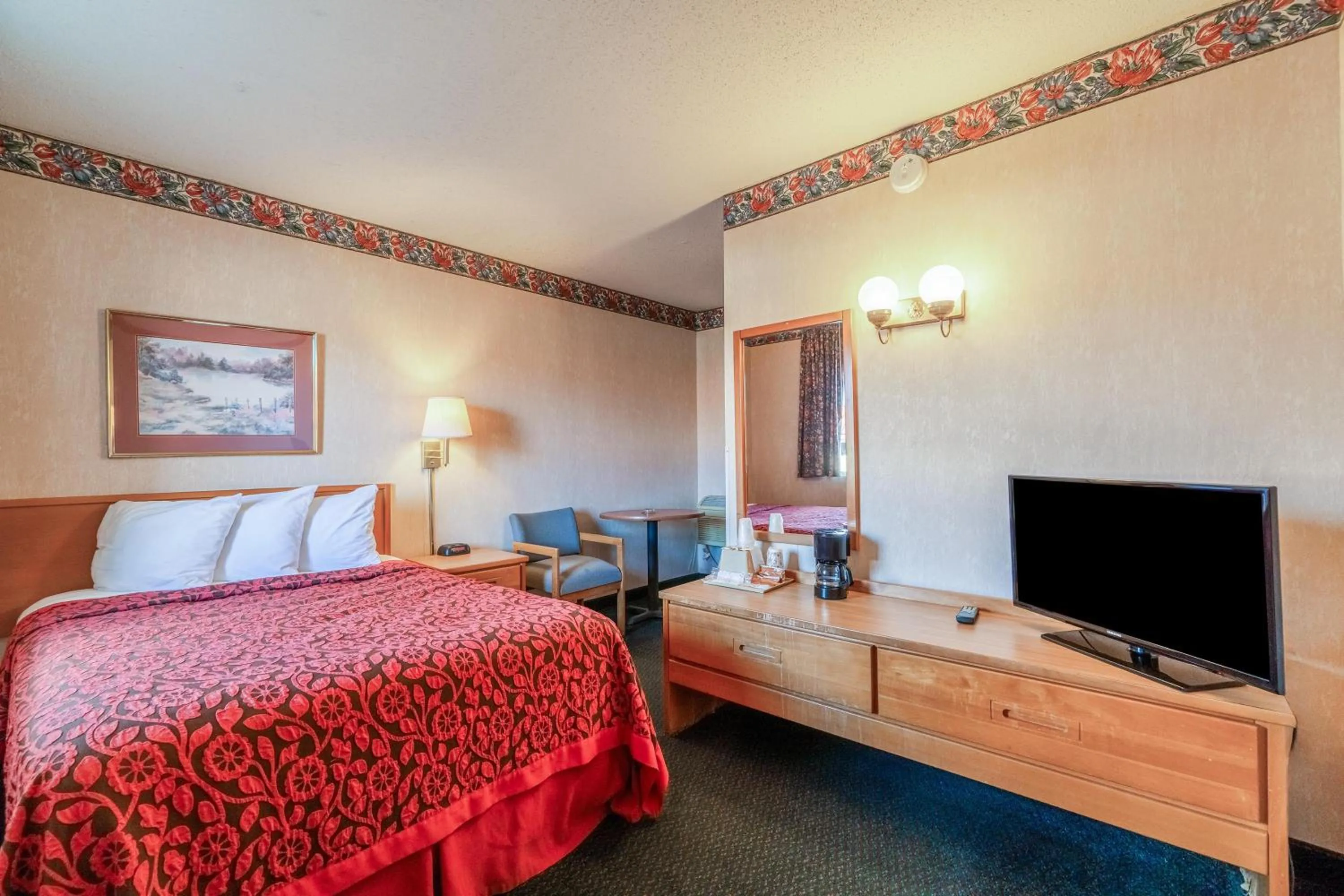 Bedroom, Bed in Ozark Junction mountain view by OYO