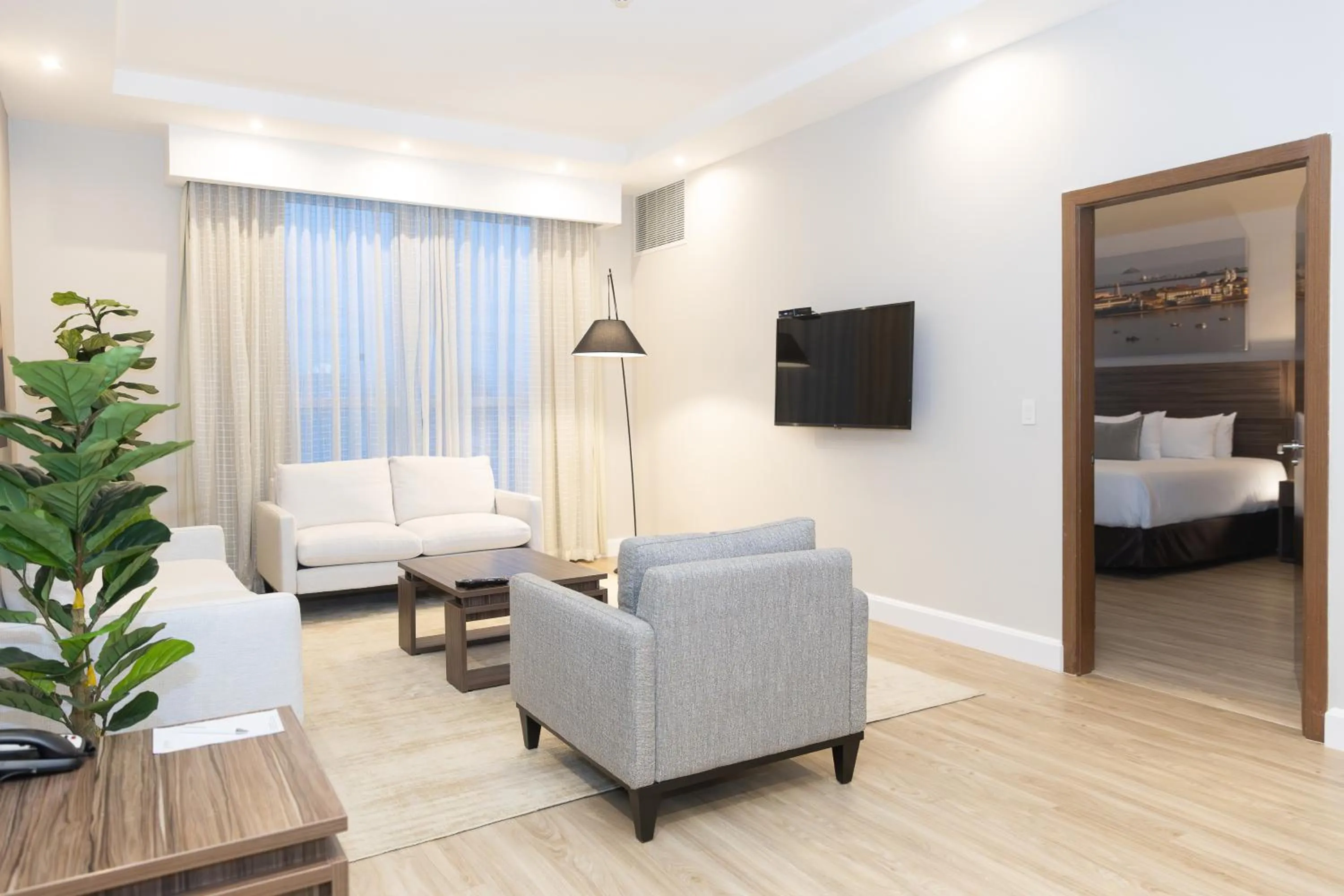 Bed in Victoria Hotel and Suites Panama