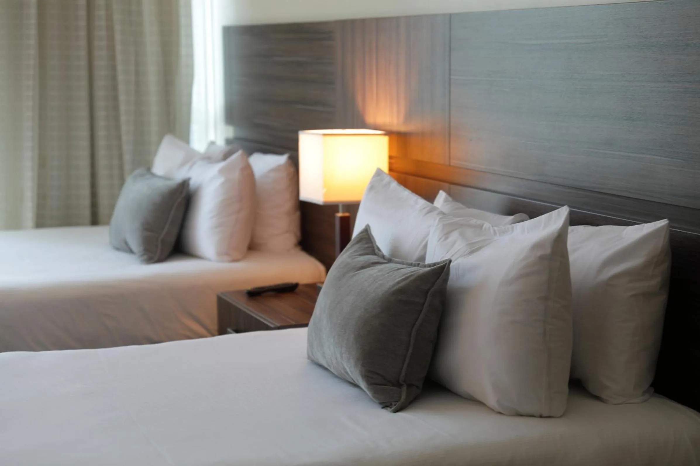 Bed in Victoria Hotel and Suites Panama