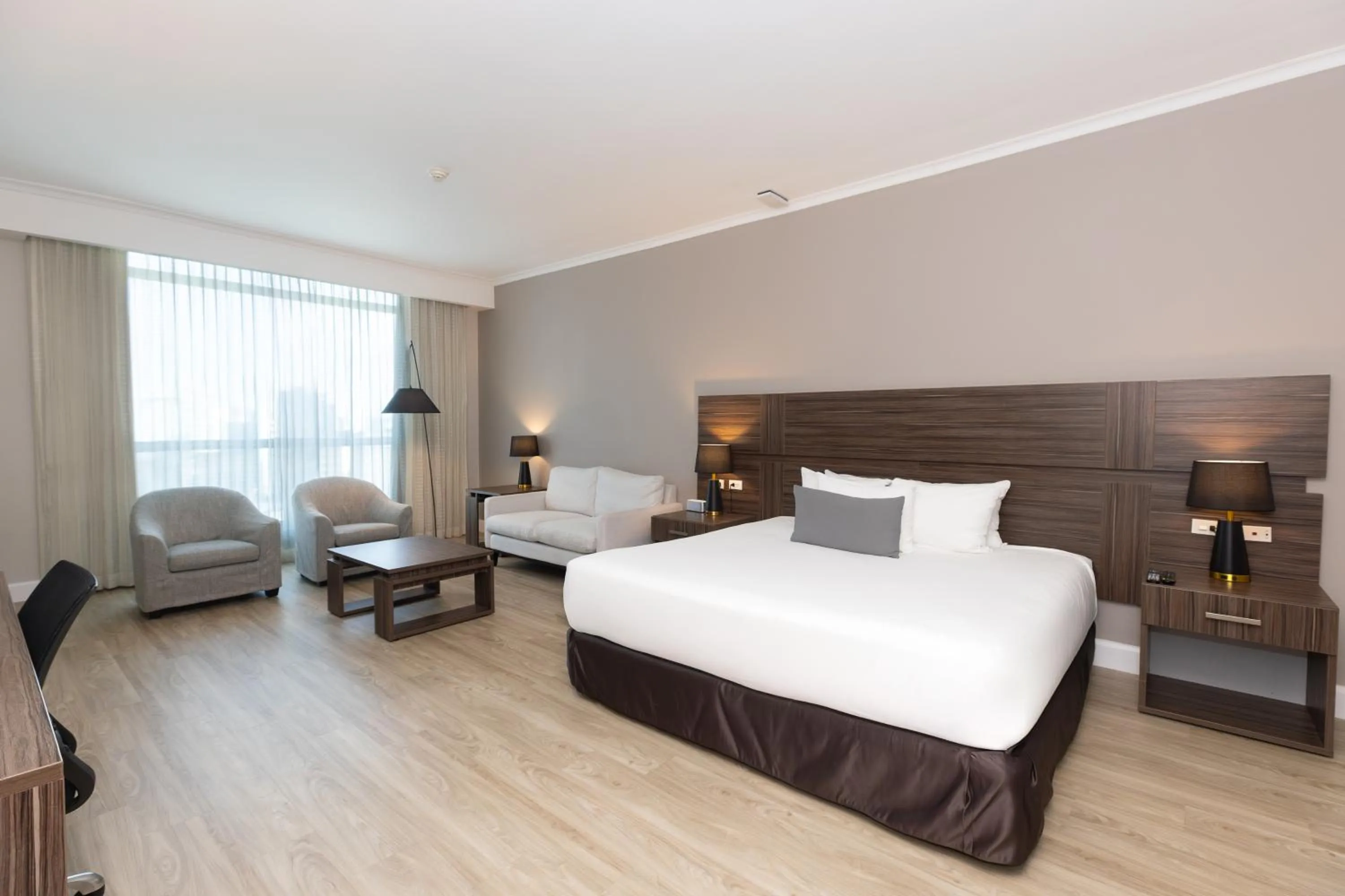 Bed in Victoria Hotel and Suites Panama