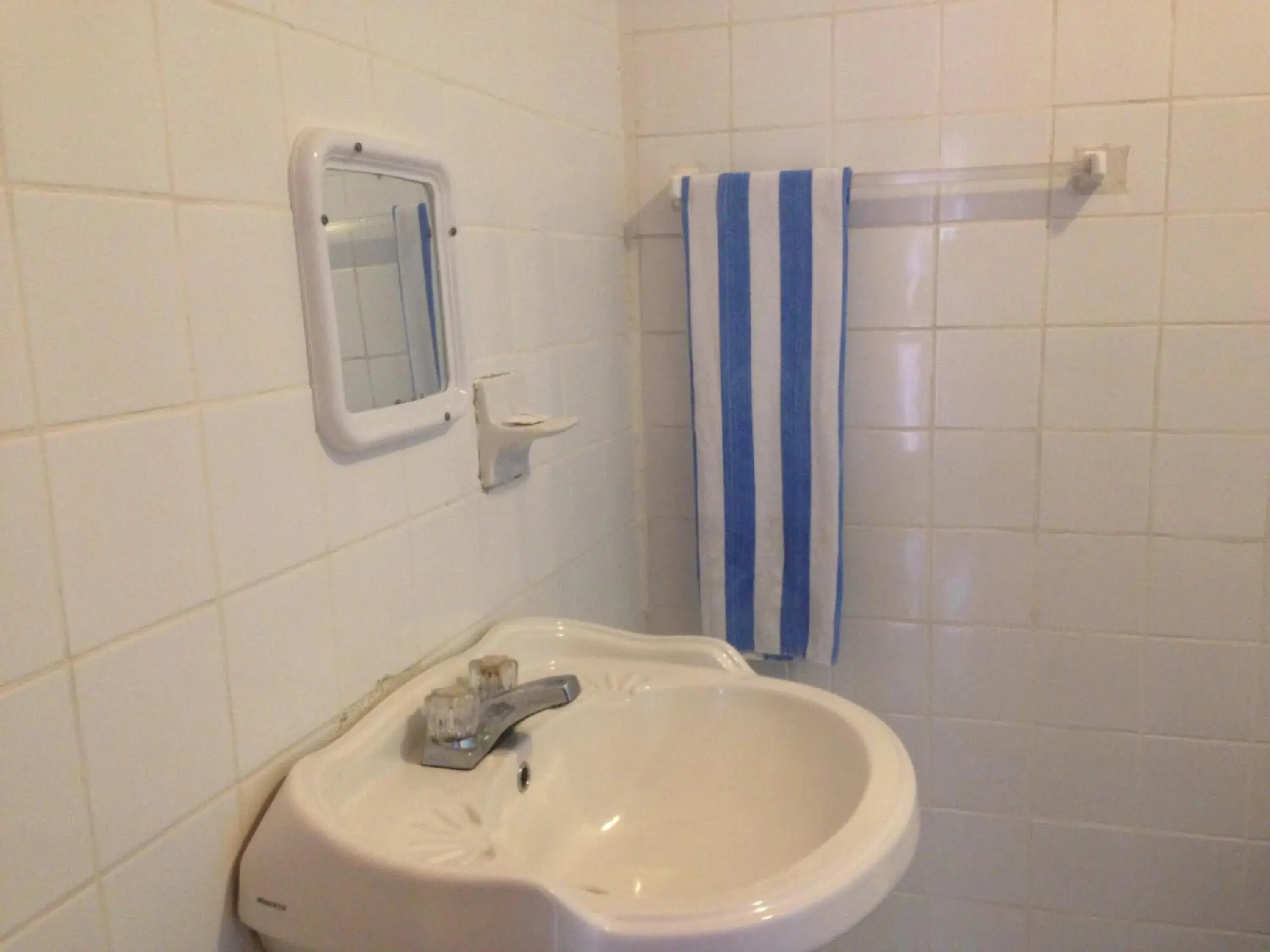 Single Room in La Delphina Bed and Breakfast Bar and Grill Single Room in La Delphina Bed and Breakfast Bar and Grill