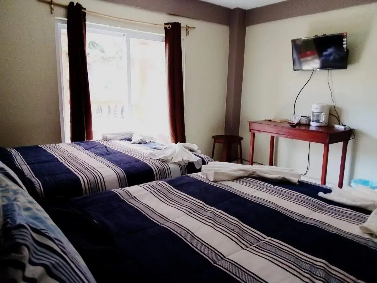 Twin Room in La Delphina Bed and Breakfast Bar and Grill Twin Room in La Delphina Bed and Breakfast Bar and Grill