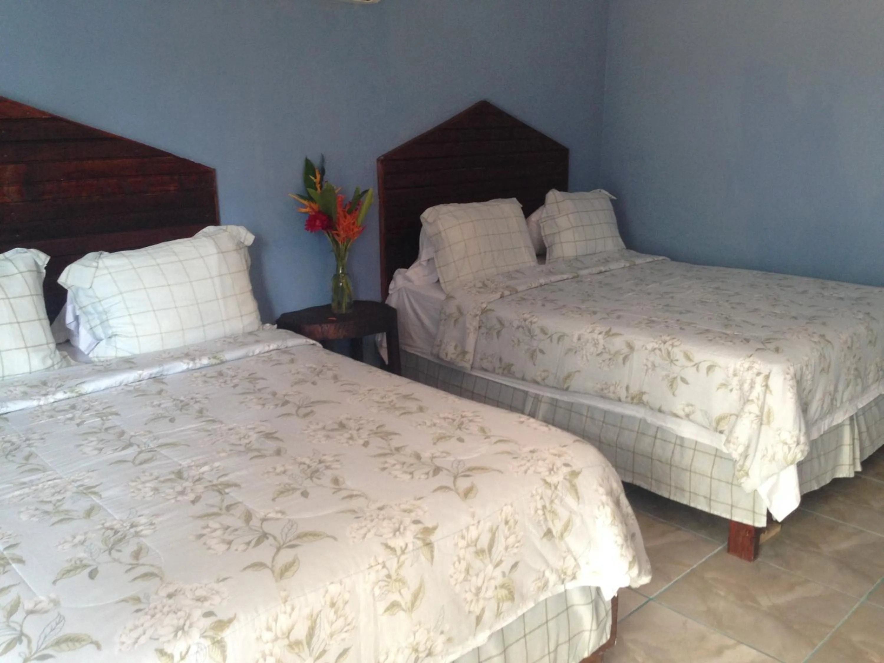 Bedroom in La Delphina Bed and Breakfast Bar and Grill