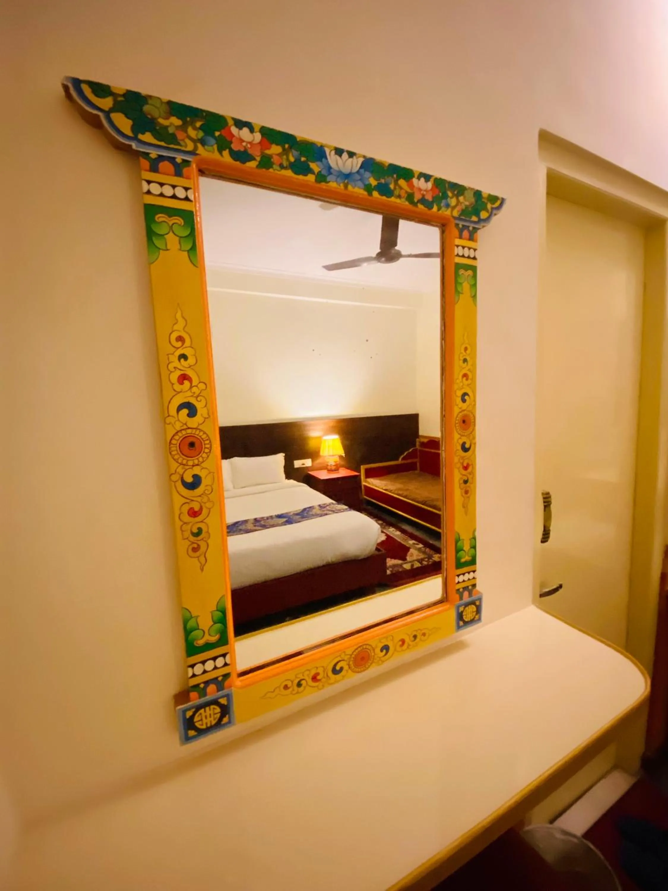 Bed in Three Jewels Boutique Hotel