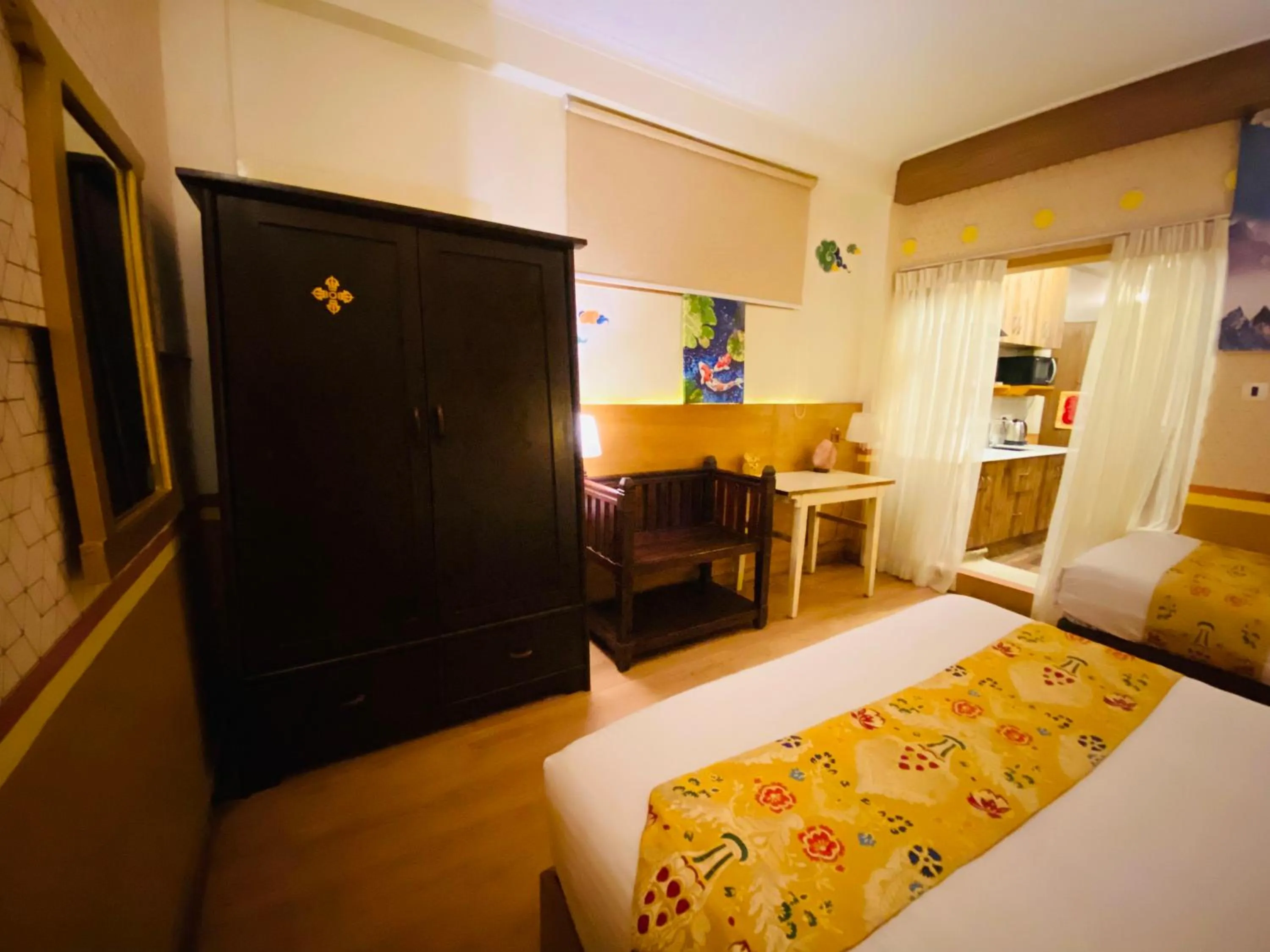 Bed in Three Jewels Boutique Hotel