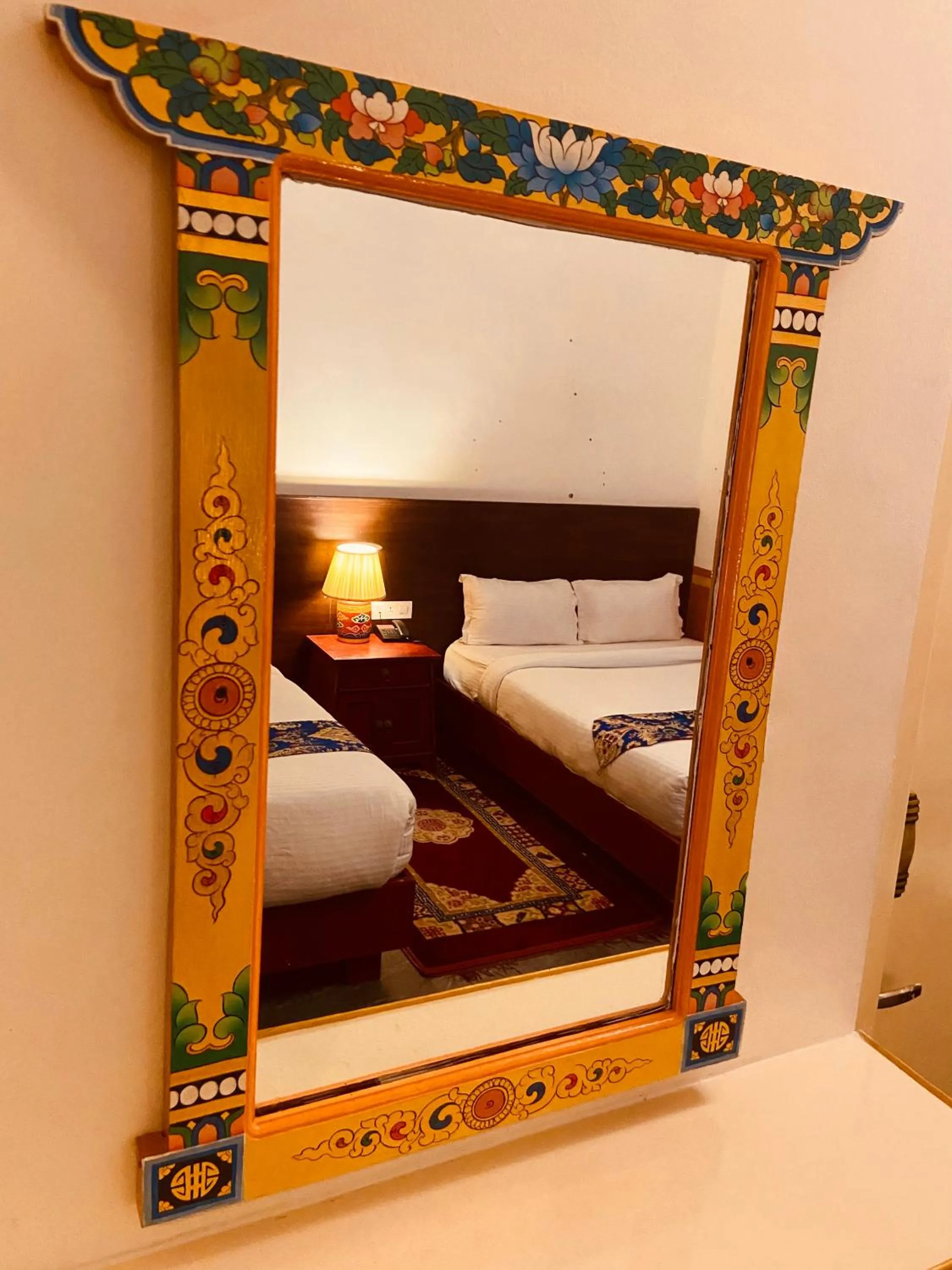 Bed in Three Jewels Boutique Hotel