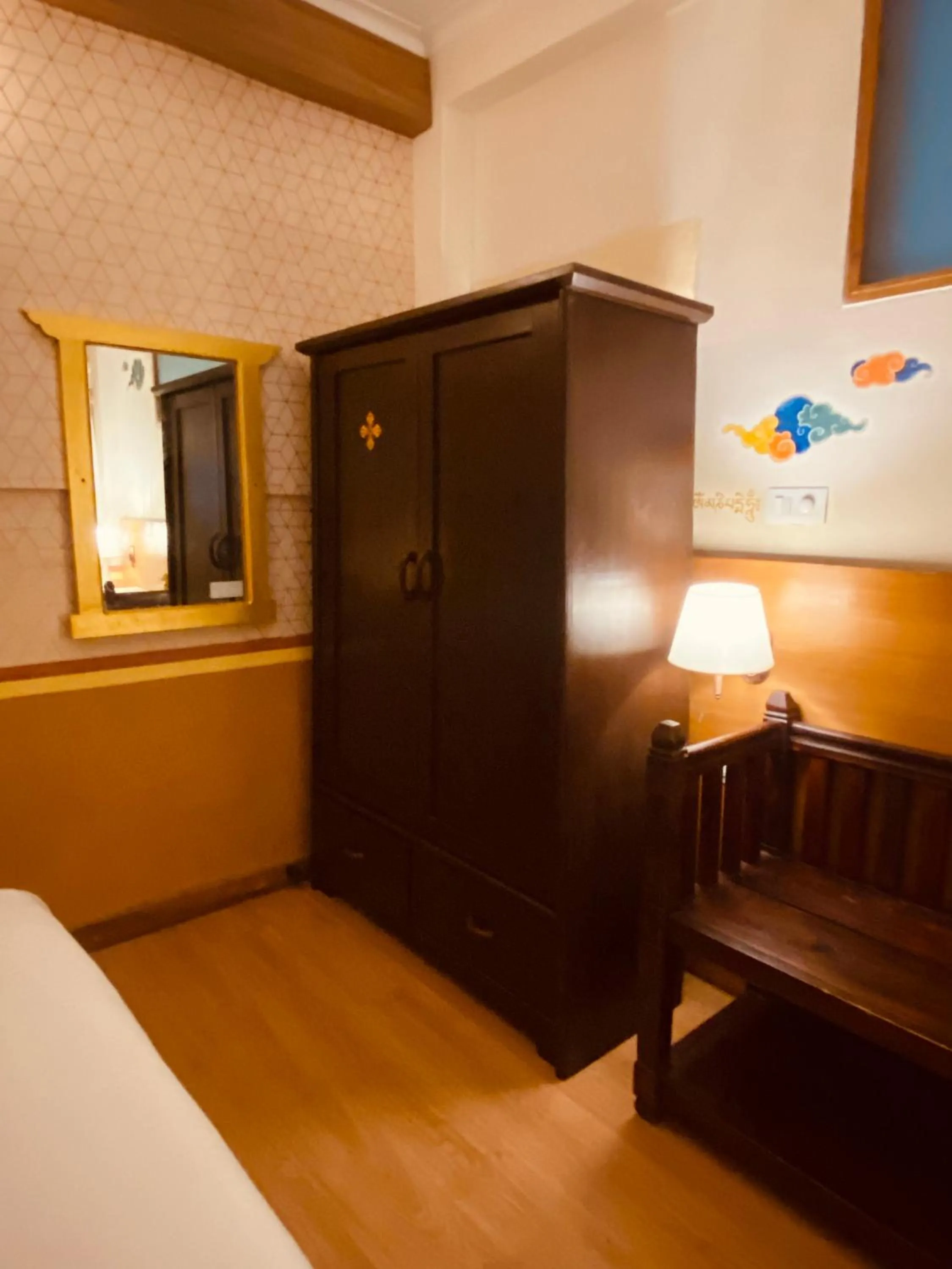 Bed in Three Jewels Boutique Hotel