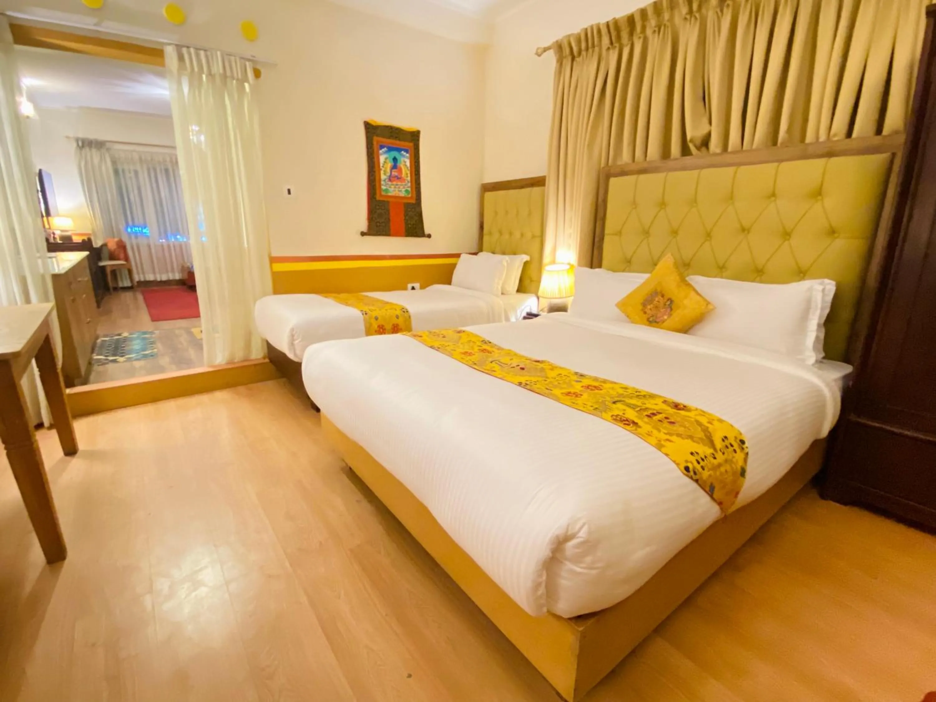 Bed in Three Jewels Boutique Hotel