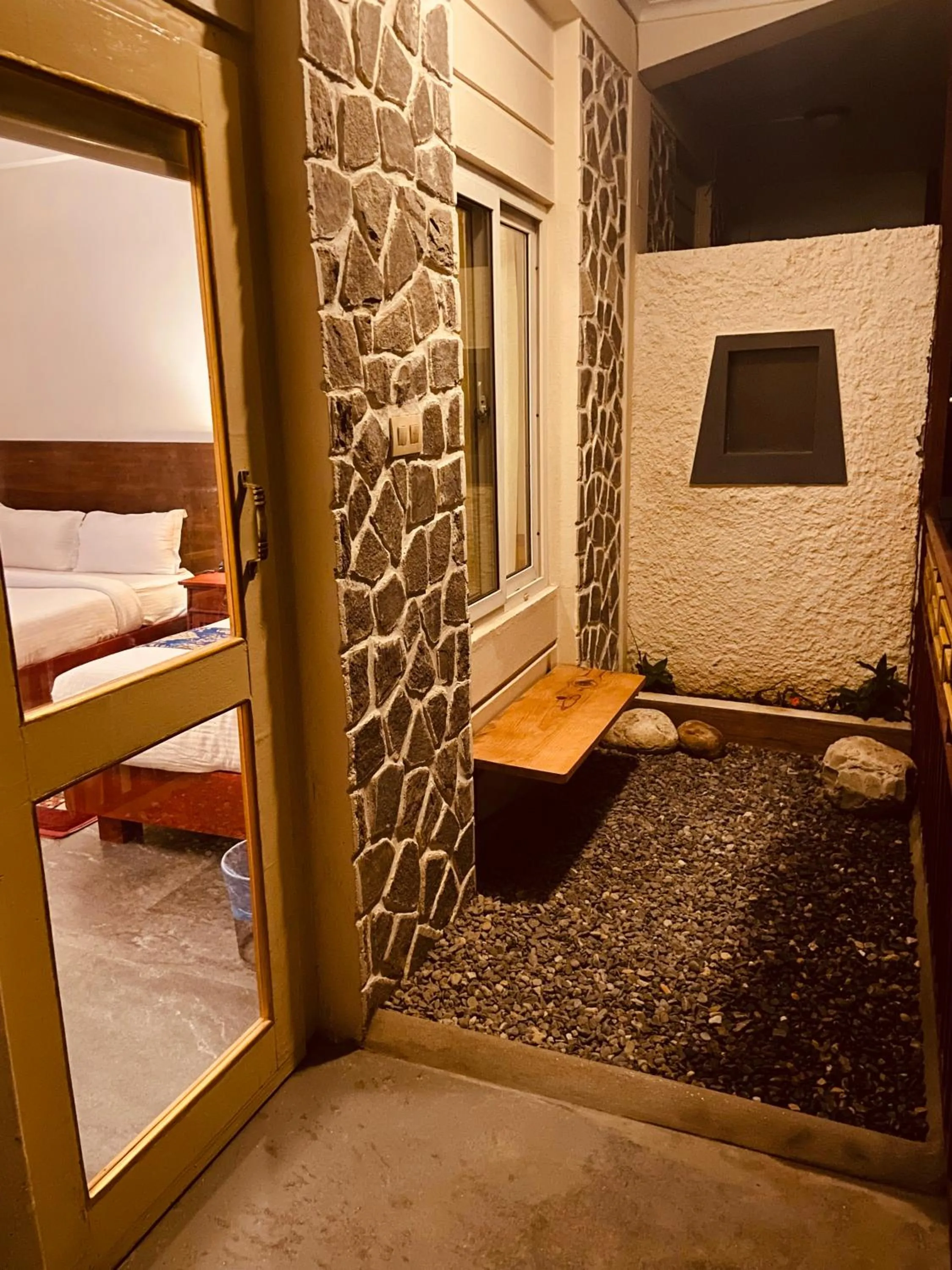 Bed in Three Jewels Boutique Hotel