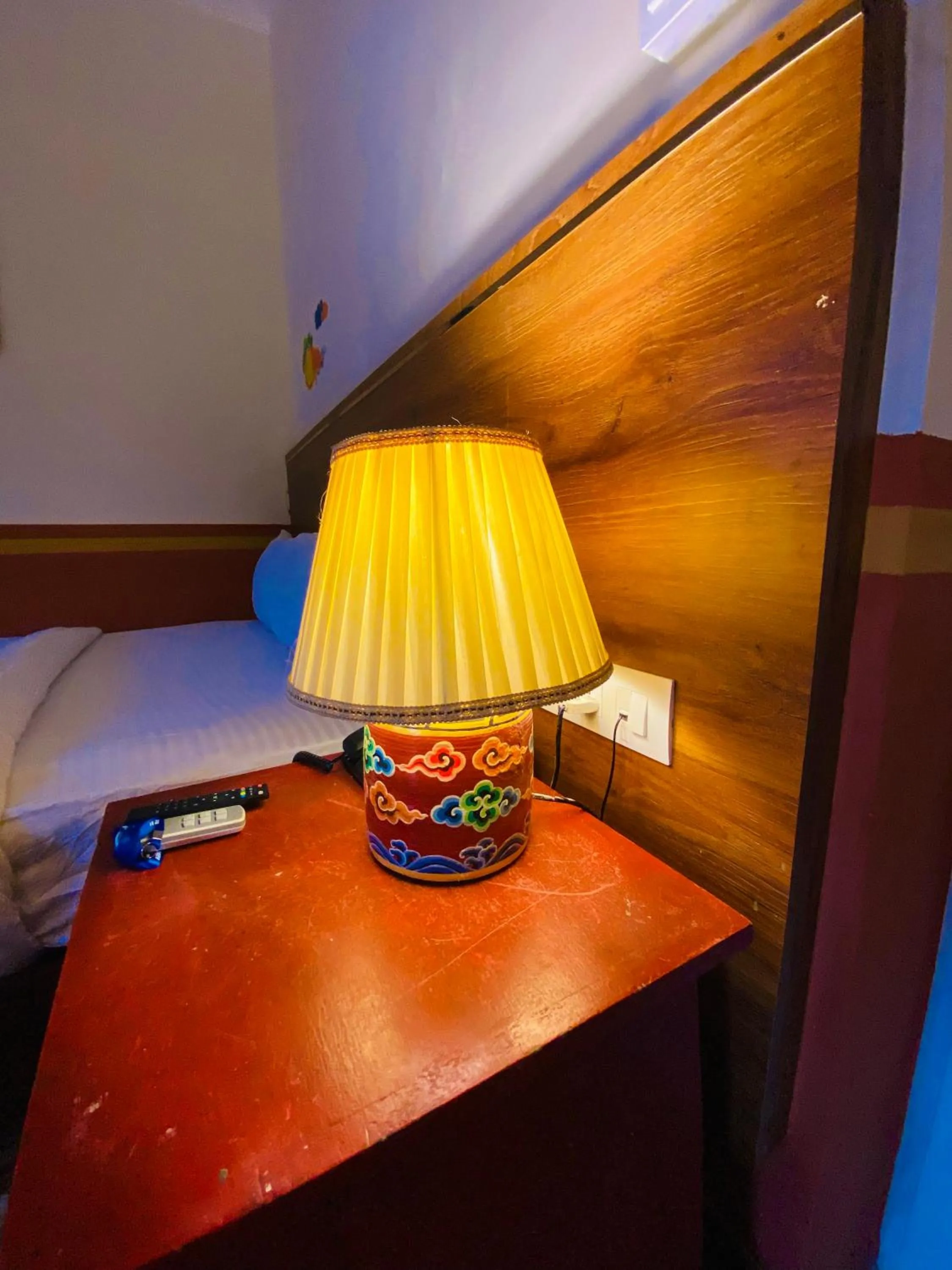 Bed in Three Jewels Boutique Hotel