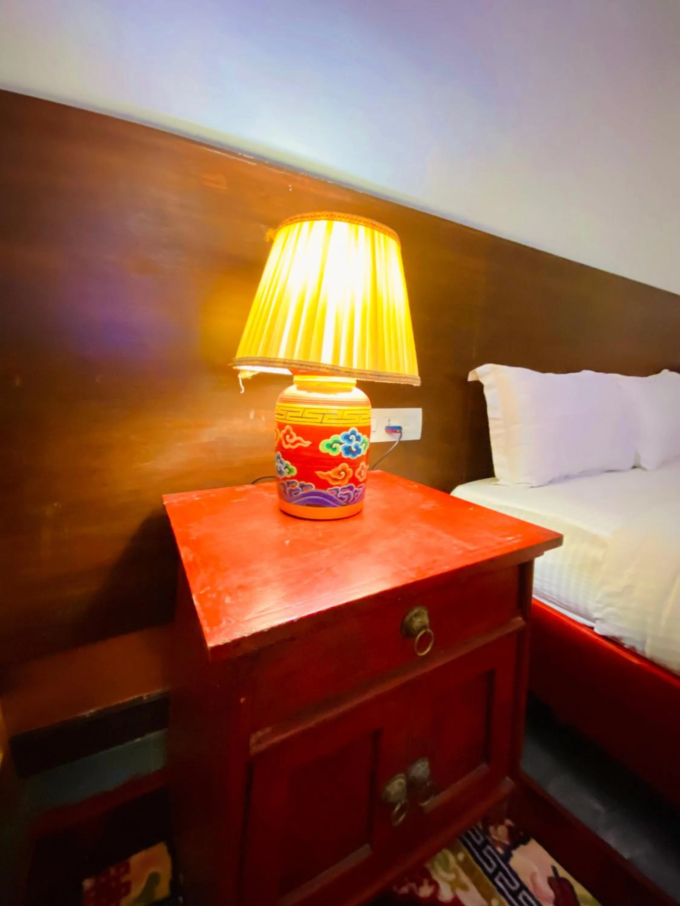 Bed in Three Jewels Boutique Hotel