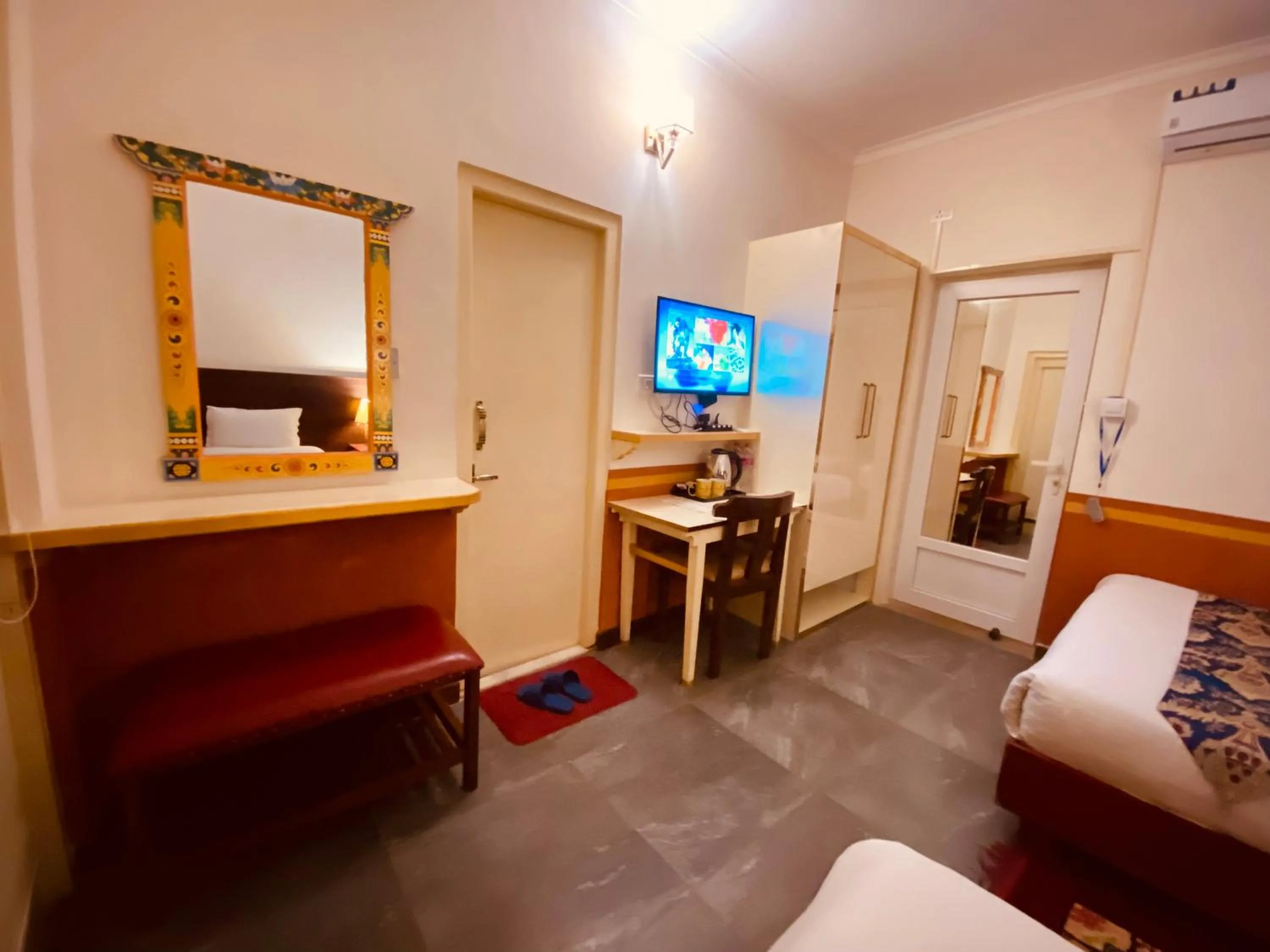 Bed in Three Jewels Boutique Hotel