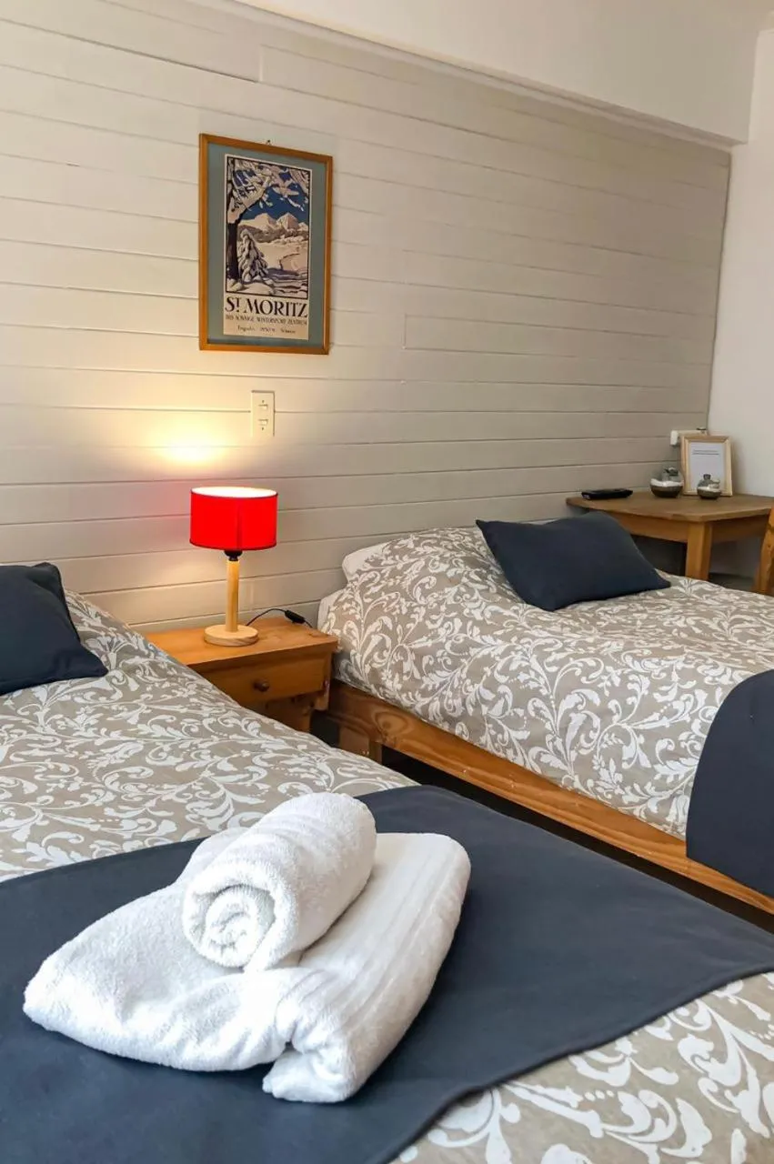Bed in Hostería Suiza - Ex Casita Suiza